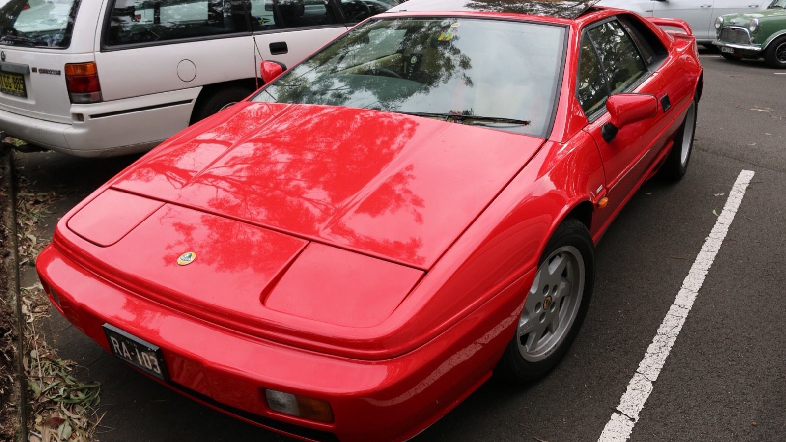 Red 1990 Lotus Esprit Turbo, front three-quarter view.