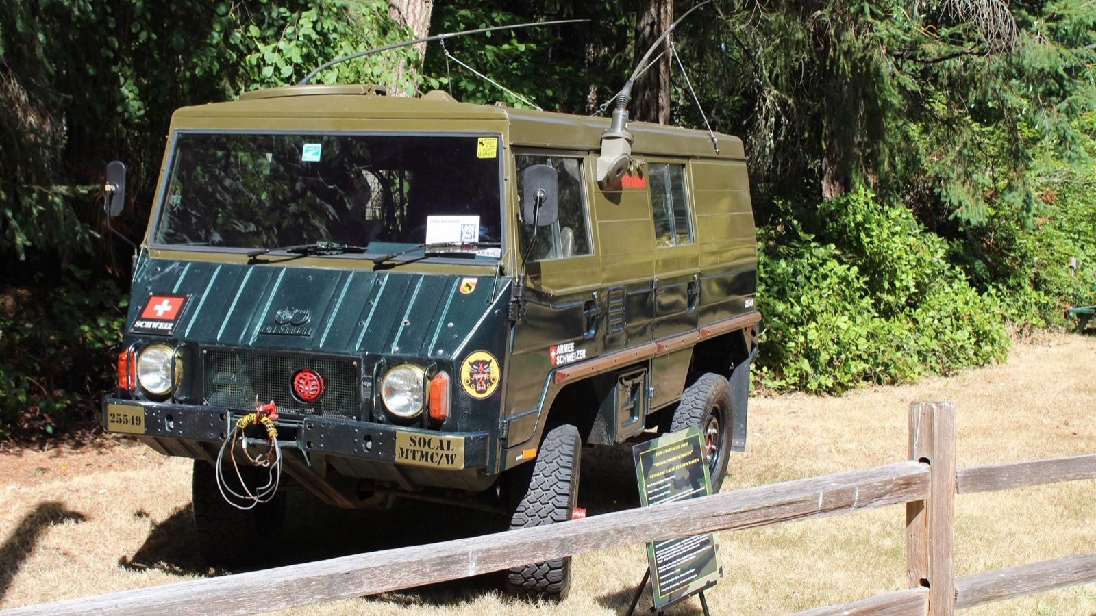 Olive-green 1976 Steyr-Puch Pinzgauer 710K ex-Swiss Army command radio wagon, front three-quarter view