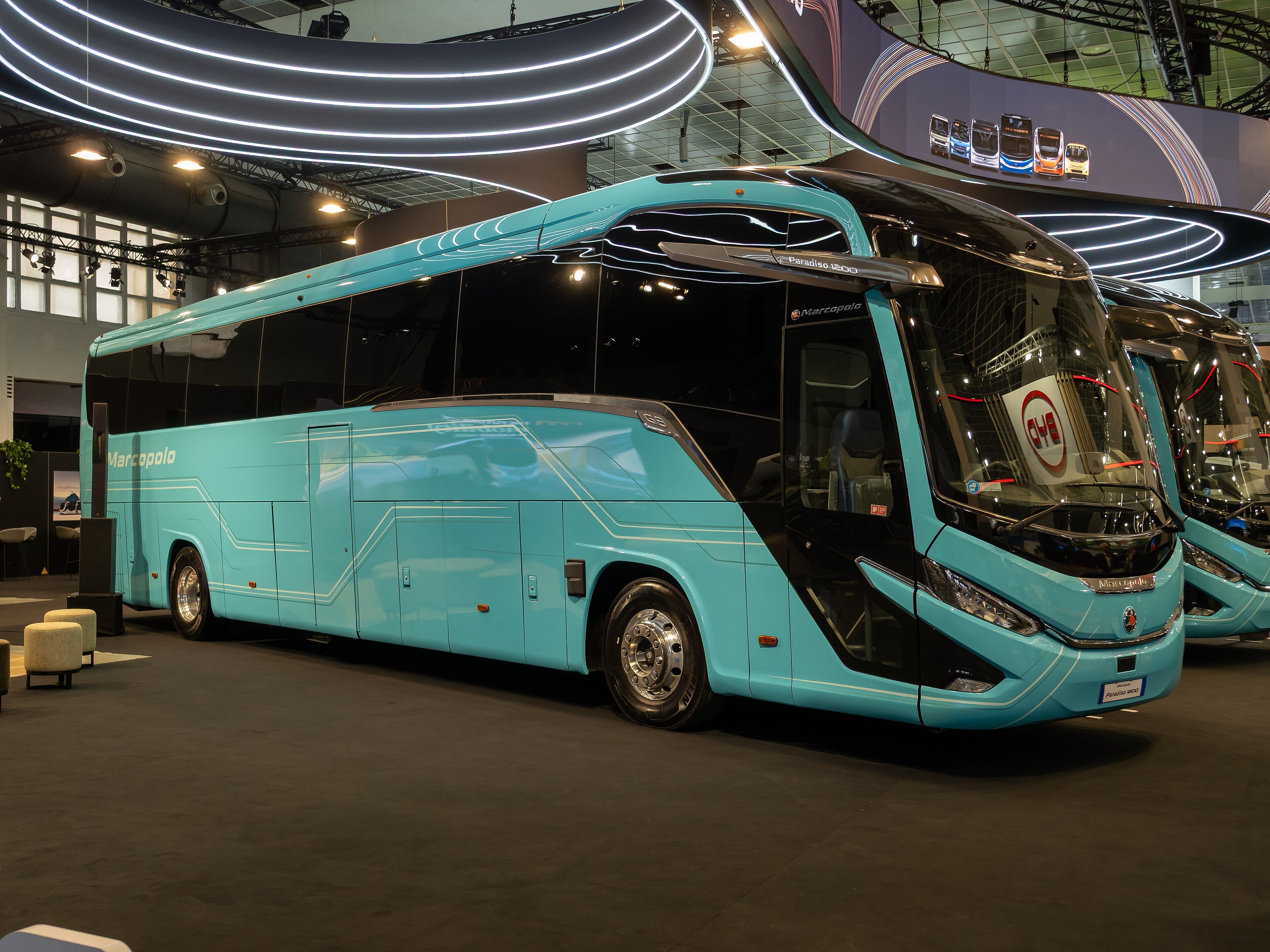 Marcopolo Paradiso 1200 G8 coach, left side profile, in turquoise livery