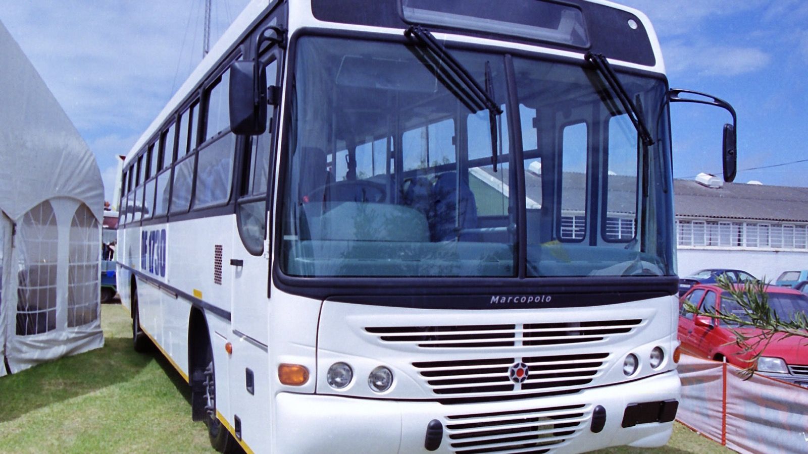 Marcopolo Torino GV bus body, front three-quarter view in plain white livery
