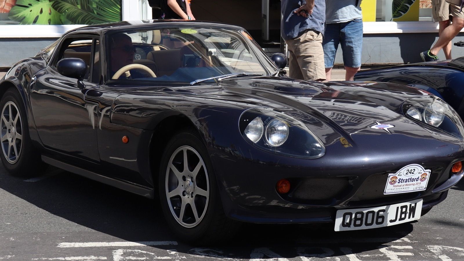 Dark blue Marcos Mantula 3.5 coupe, front three-quarter view