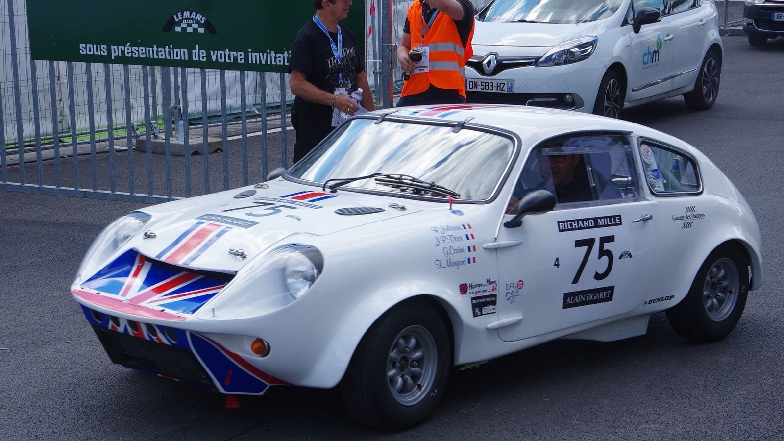 White Mini Marcos GT in Union Jack racing livery, front three-quarter view