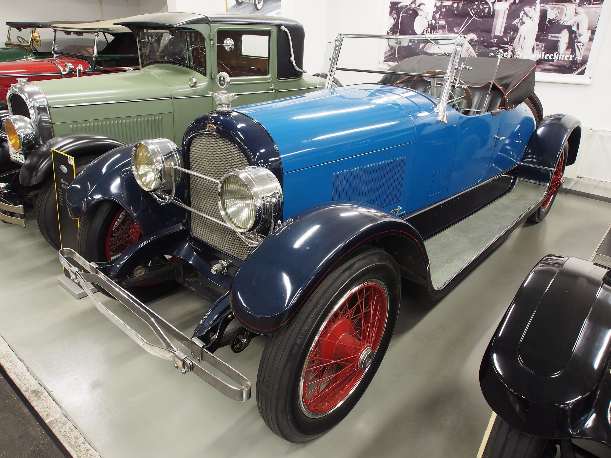 Blue 1922 Marmon Model 34 speedster, front three-quarter view