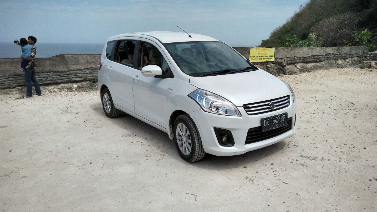 White 2015 Suzuki Ertiga GX compact MPV, front three-quarter view