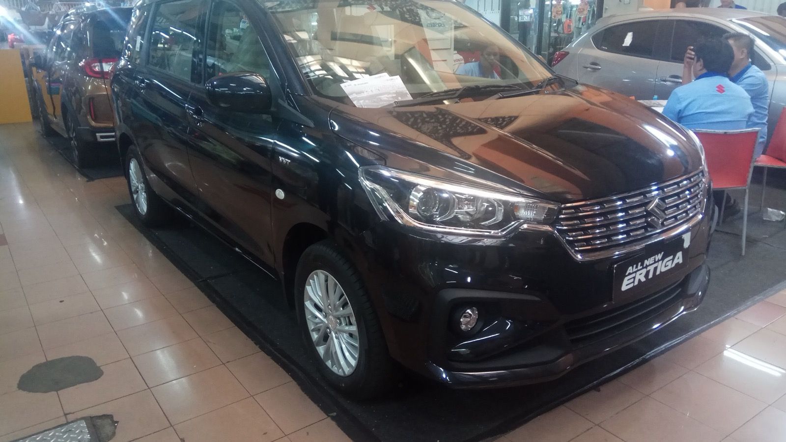Black 2019 Suzuki Ertiga GL compact MPV, front three-quarter view