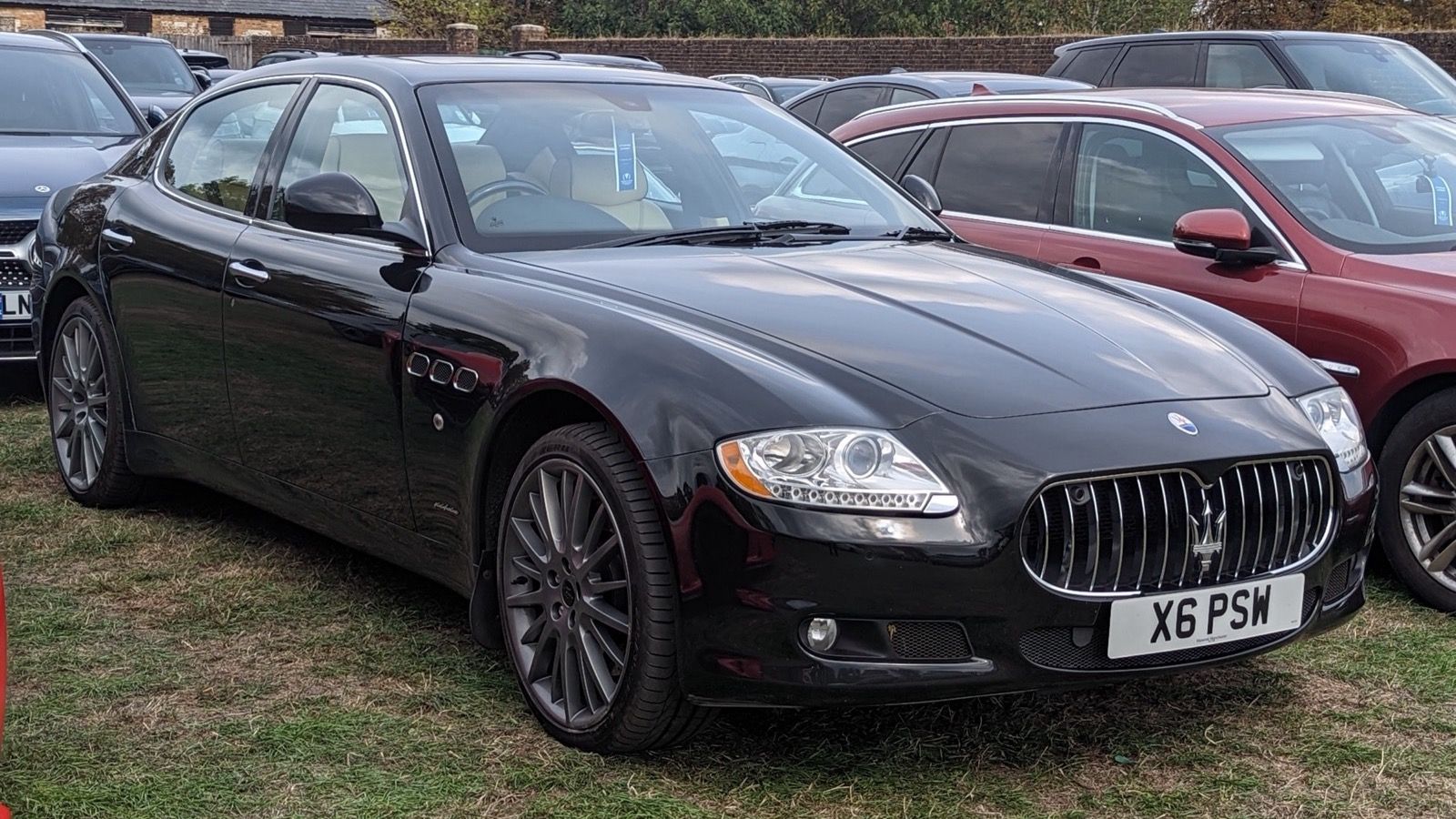 Black 2011 Maserati Quattroporte S V8 sedan, front three-quarter view