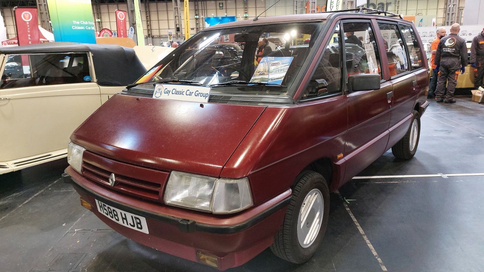 Dark red 1990 Renault Espace 2.0 TXE at an indoor classic car show, front three-quarter view