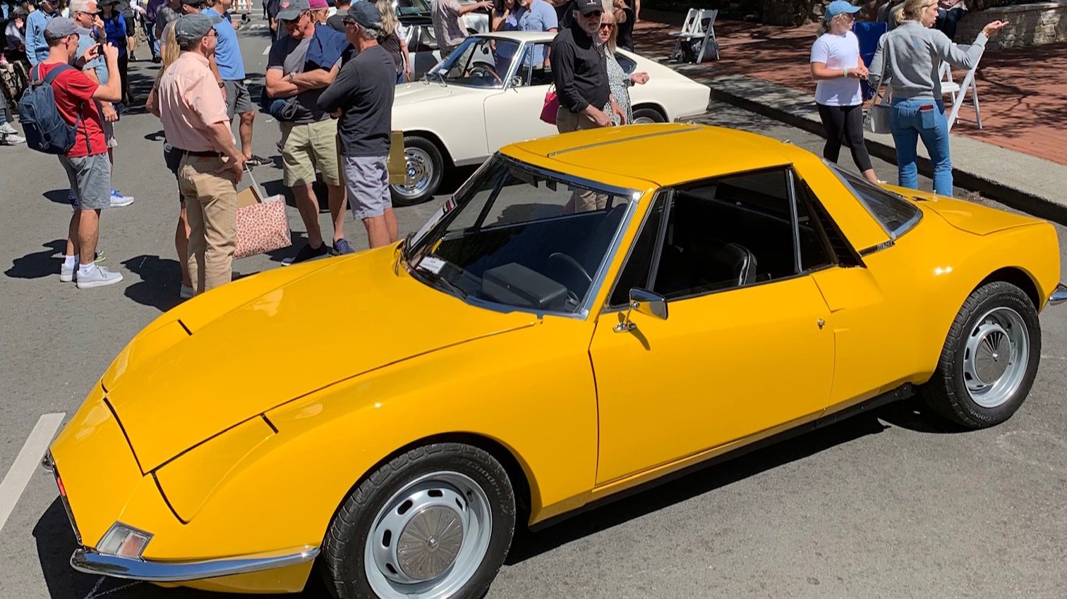 Yellow Matra M530 A targa coupé on display at a car show, front three-quarter view