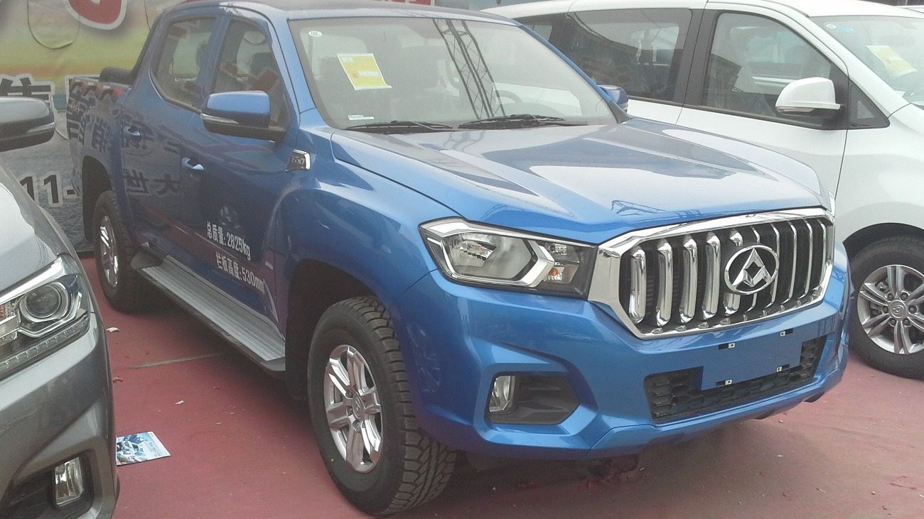 Blue 2017 Maxus T60 double-cab pickup at a Chinese dealership, front three-quarter view