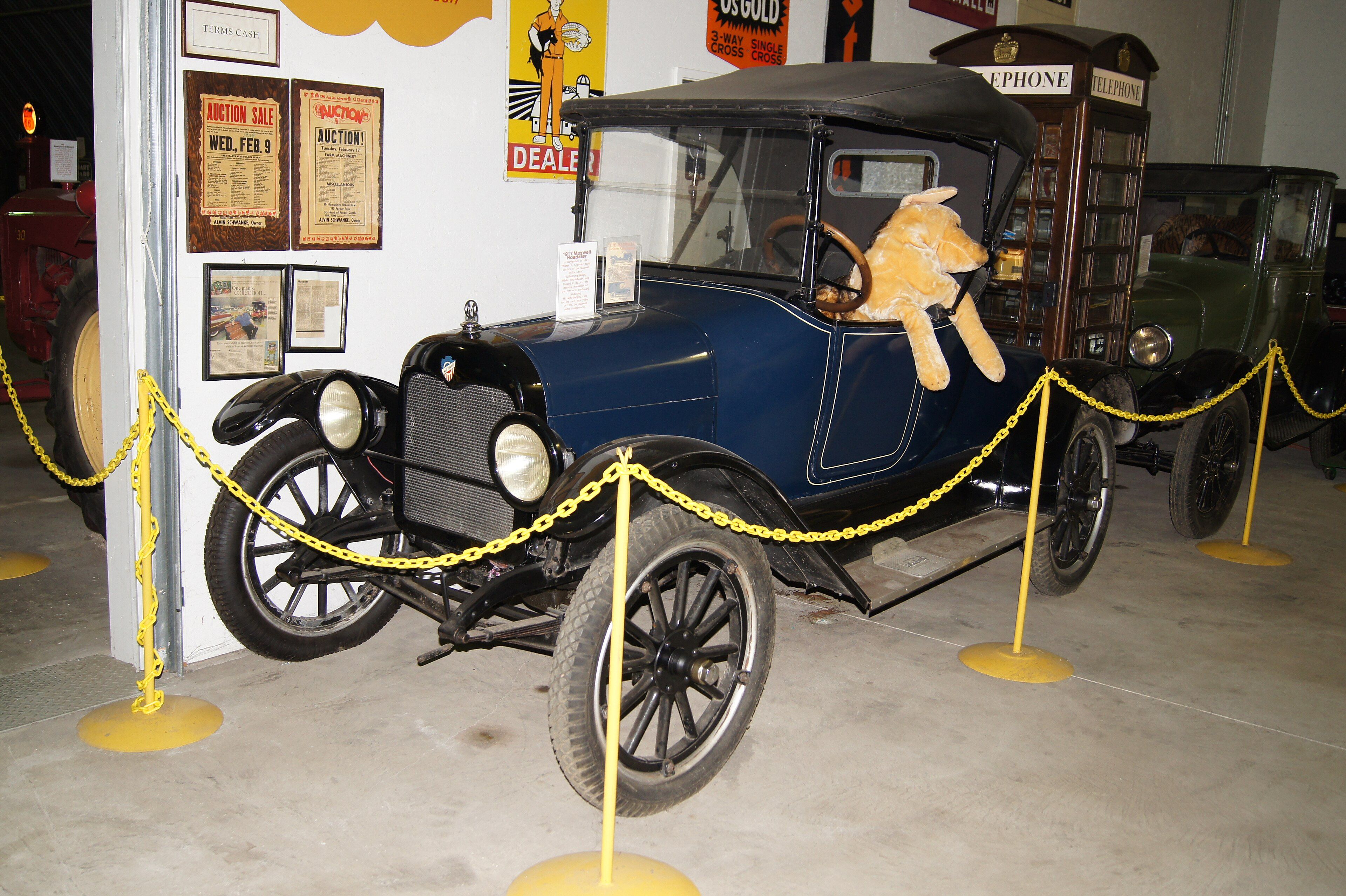 Blue 1917 Maxwell roadster on museum display, front three-quarter view