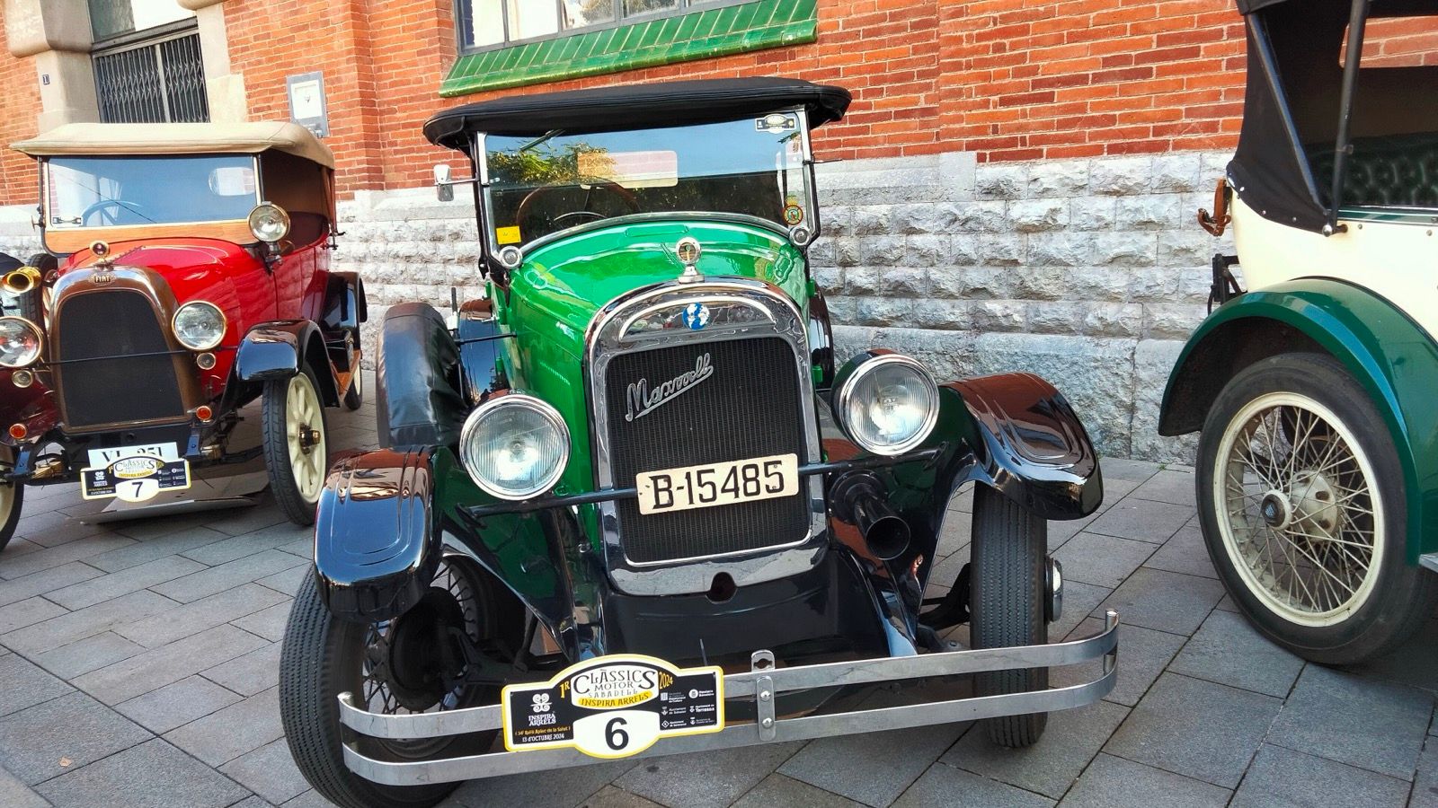 Green Chrysler-era Maxwell 25C at a classic-car meet, front view with the Maxwell badge on the radiator