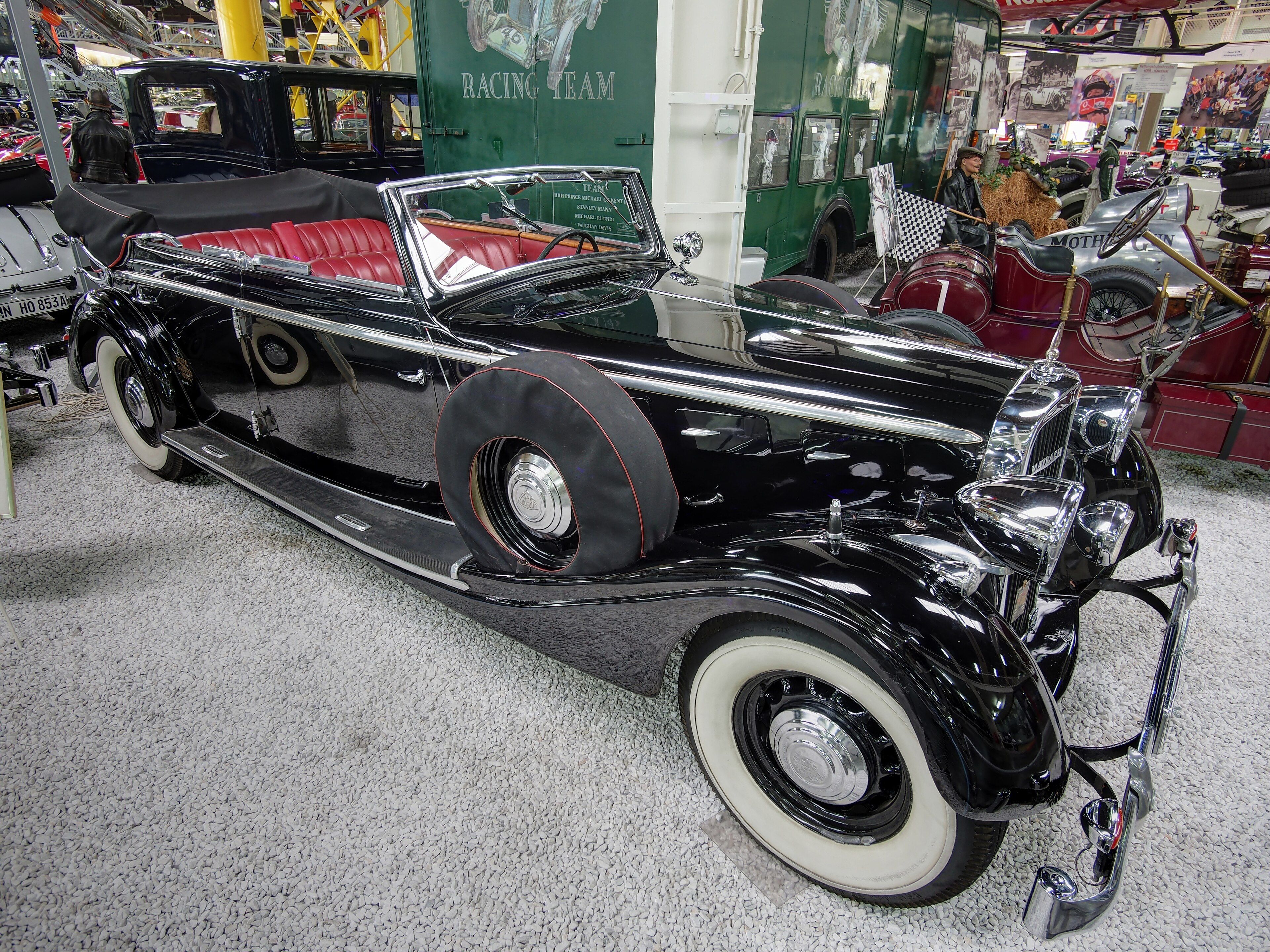 Black 1937 Maybach SW38 cabriolet with the top down, front three-quarter view