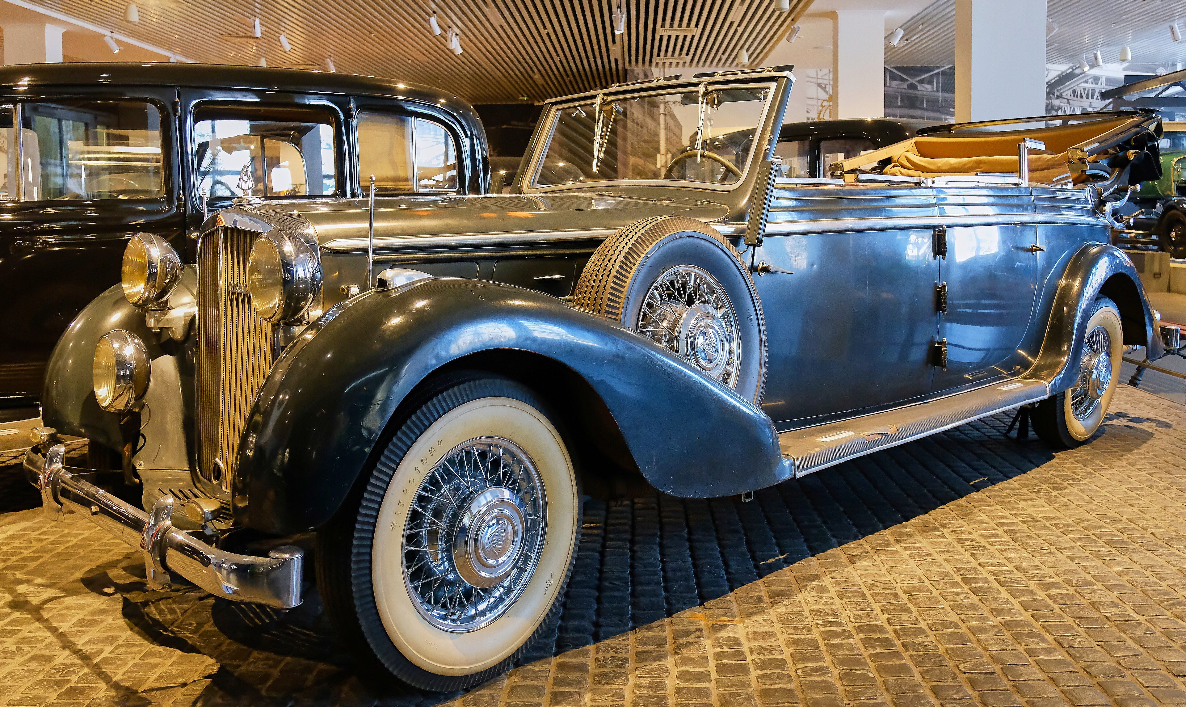 Blue Maybach SW42 Transformations-Cabriolet on museum display, front three-quarter view