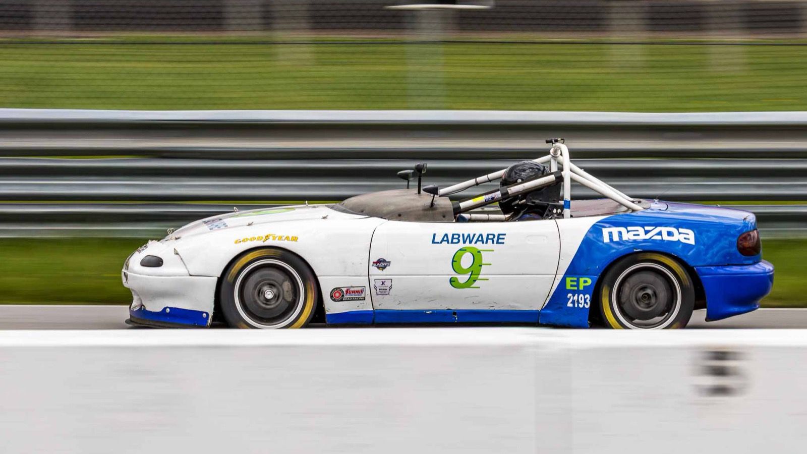 1995 Mazda MX-5 Miata, NA first generation — race-prepared roadster, side view