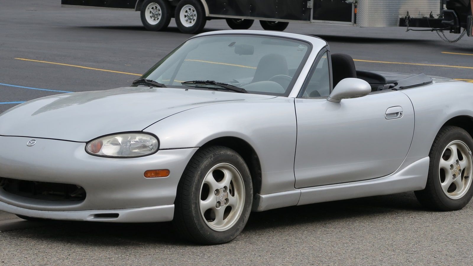 1999 Mazda MX-5 Miata, NB second generation — silver roadster, front three-quarter view