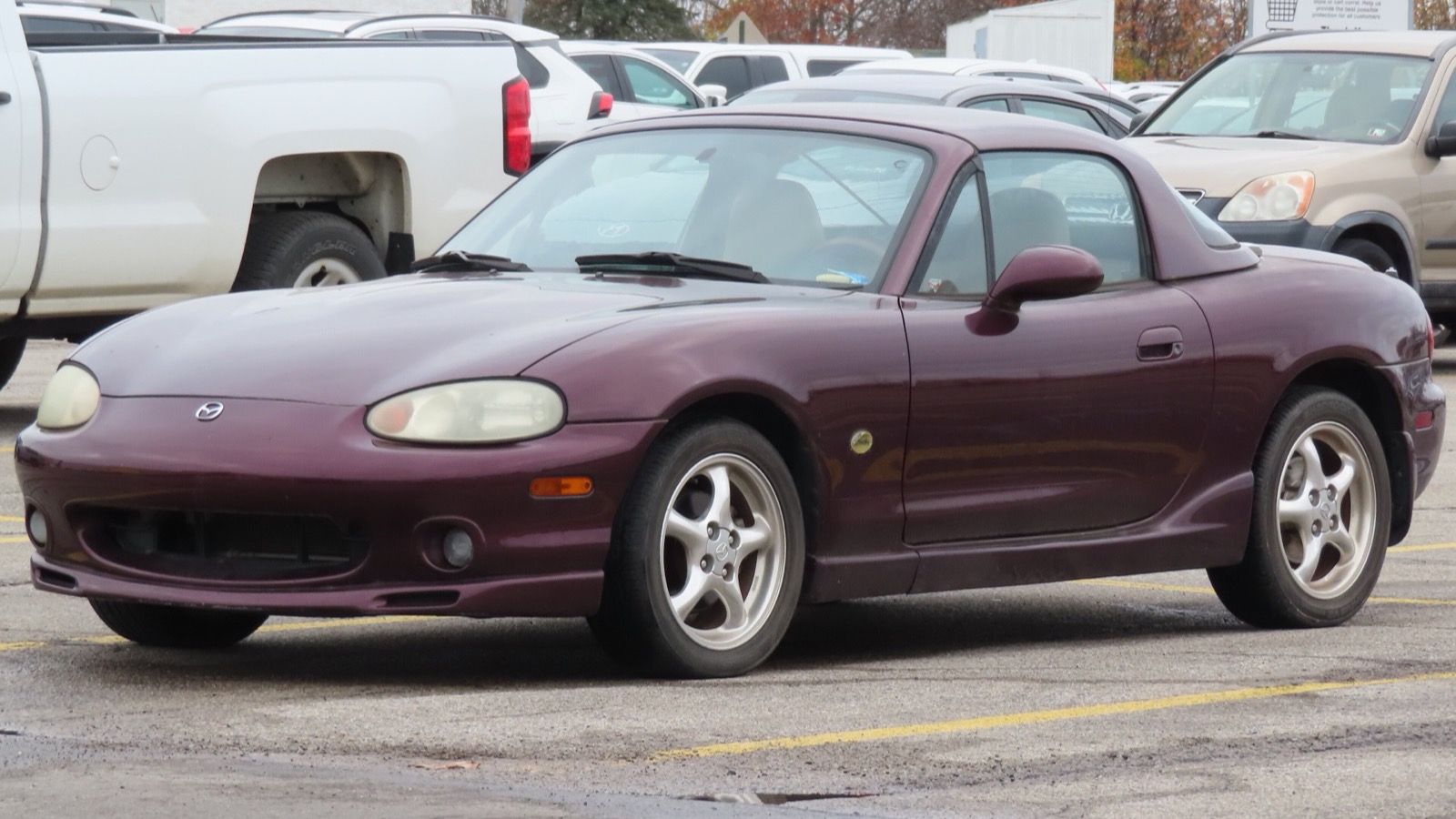 2000 Mazda MX-5 Miata, NB second generation — purple Special Edition with hardtop, front three-quarter view