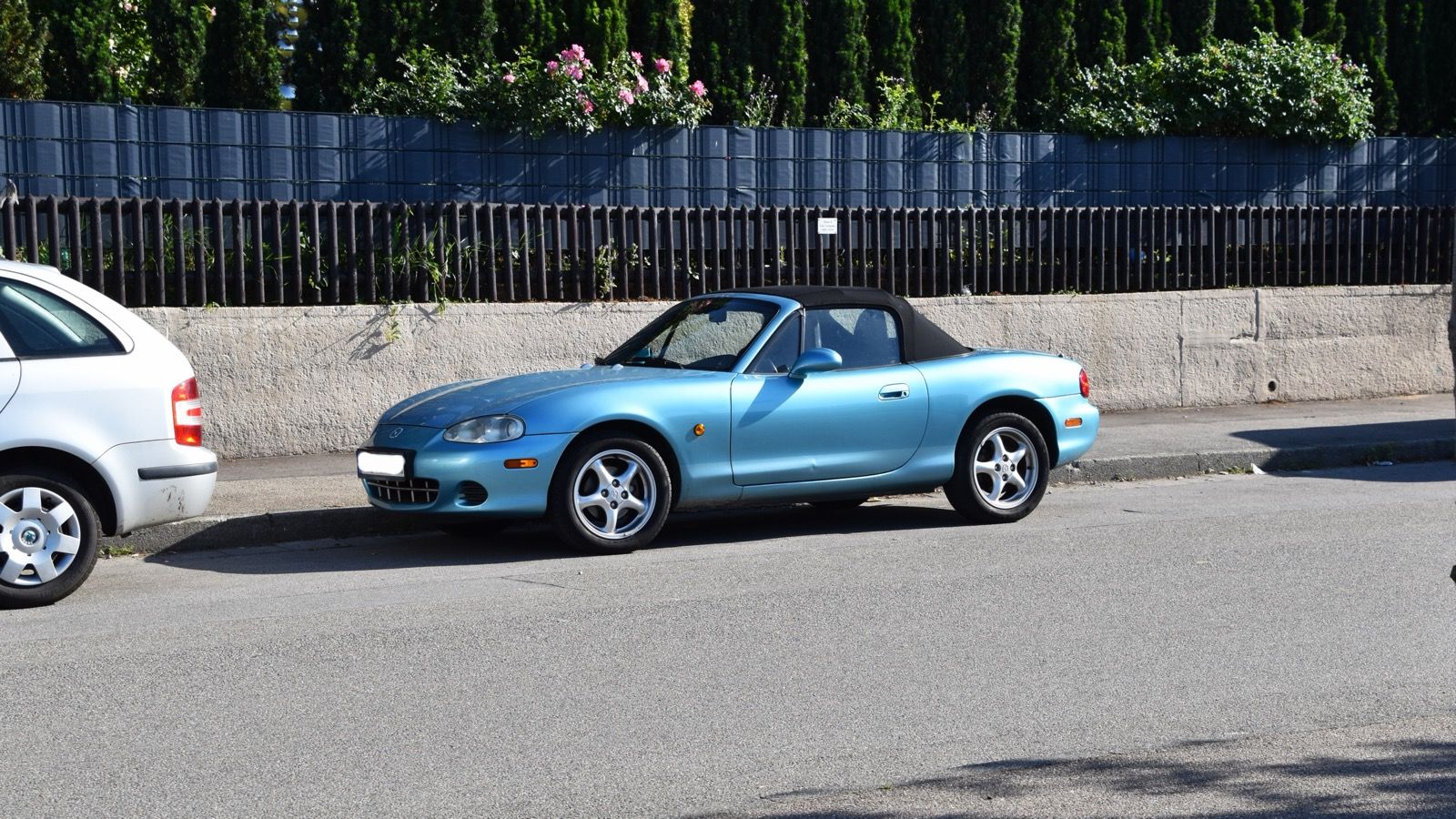2002 Mazda MX-5 Miata 1.6, NB second generation — blue roadster, front three-quarter view