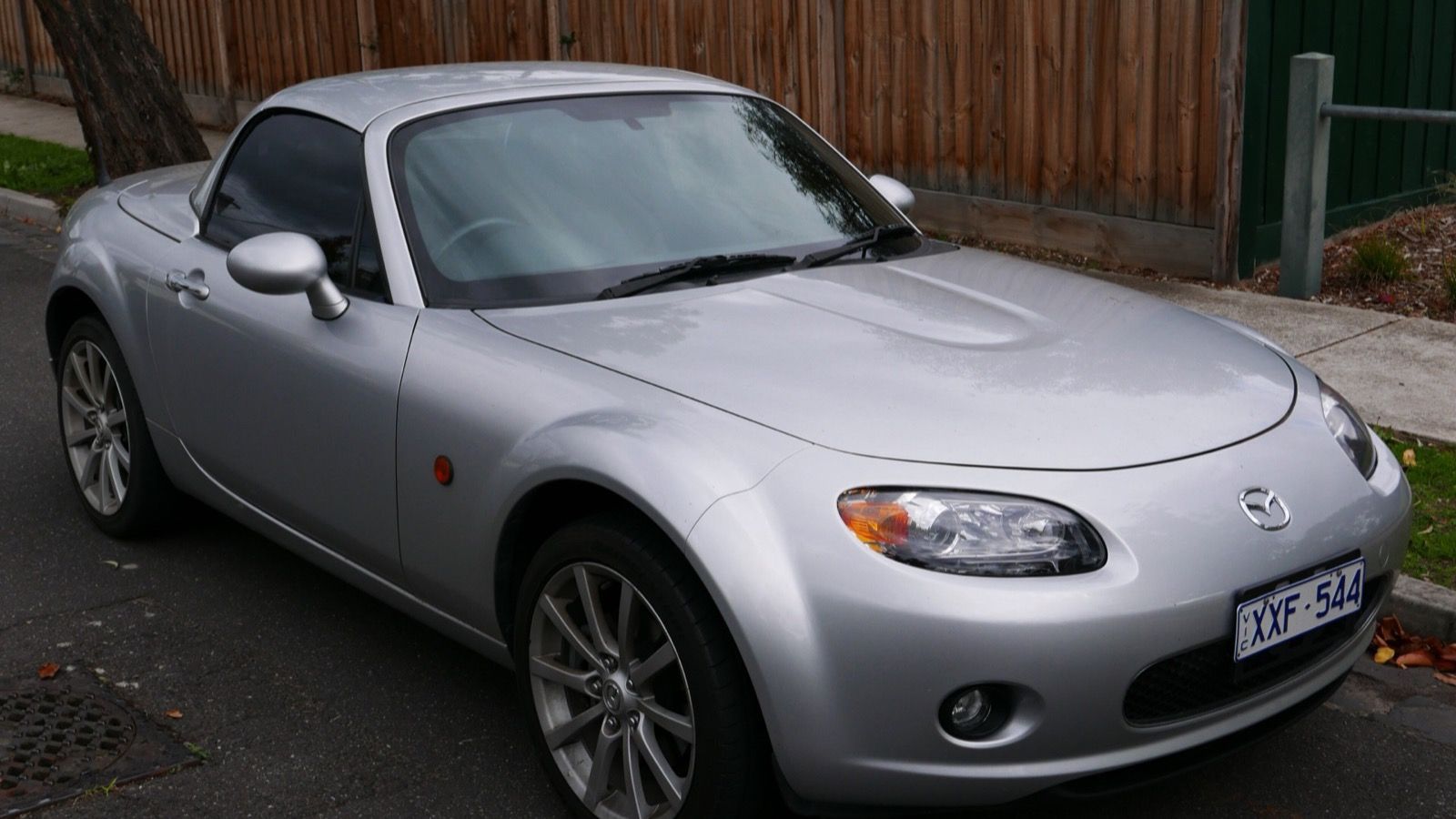 Third-generation Mazda MX-5 Miata (NC) — silver roadster, front three-quarter view