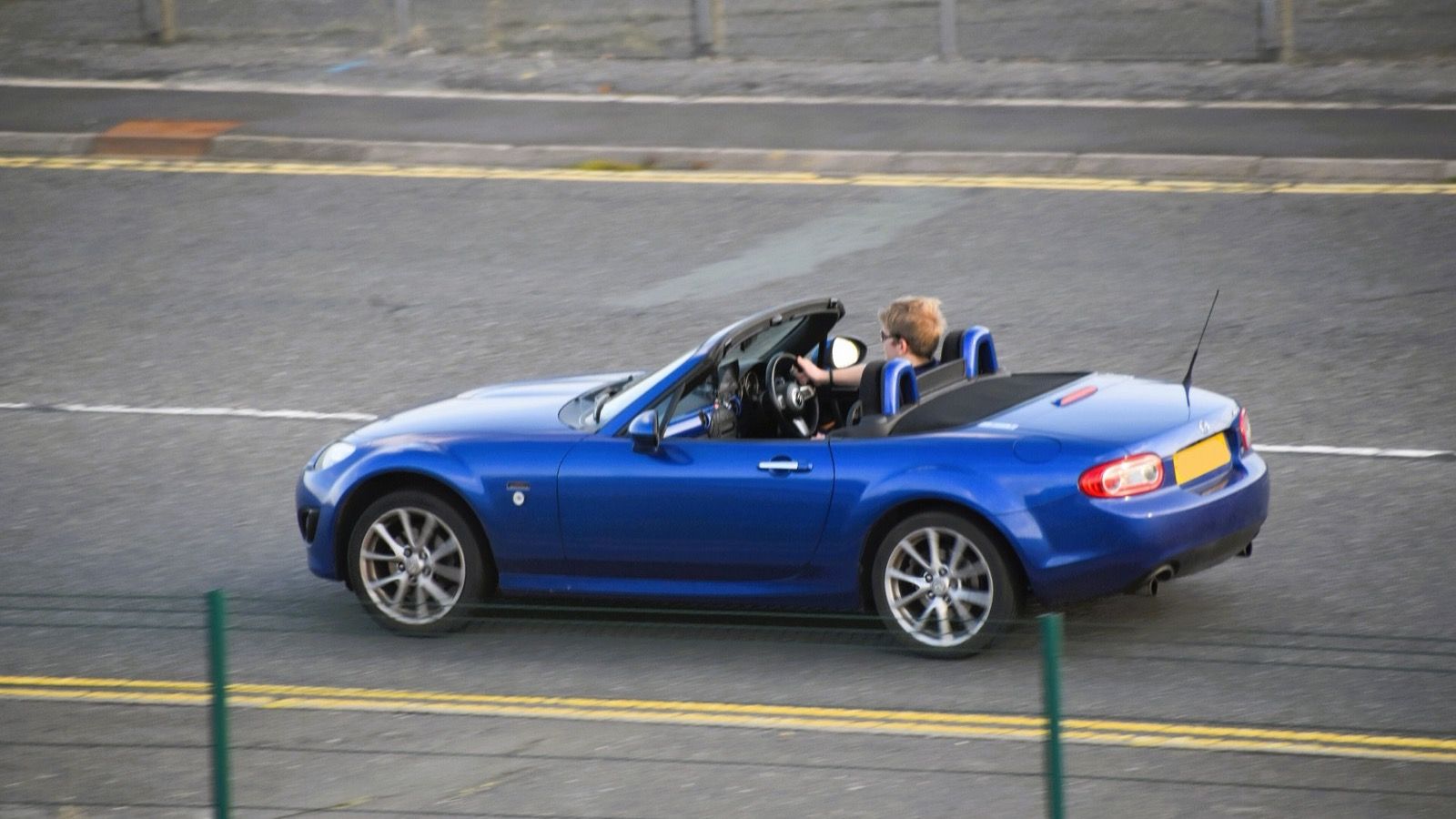 2010 Mazda MX-5 Miata, NC third generation — red roadster, front three-quarter view