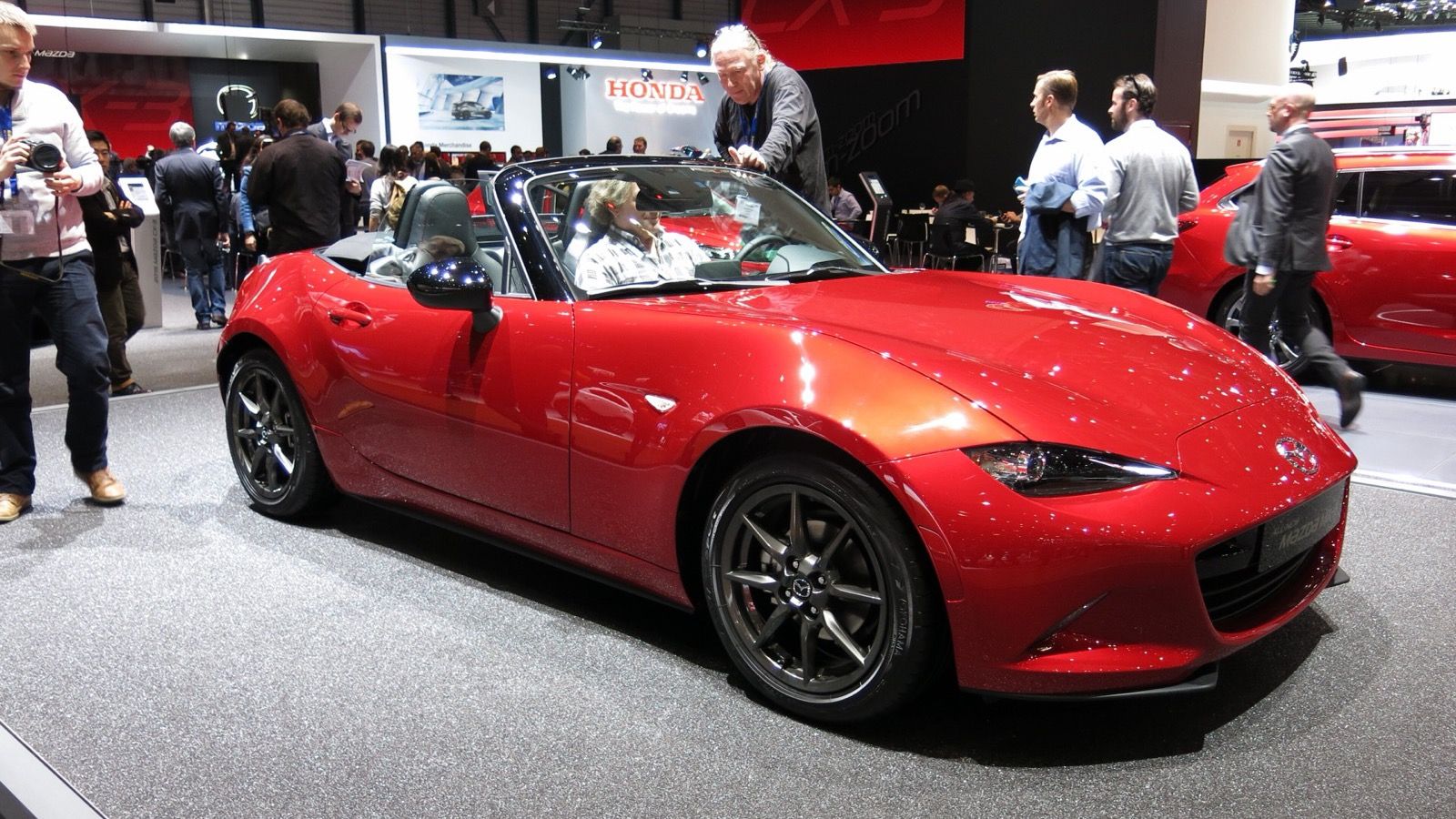2015 Mazda MX-5 Miata, NC third generation — red roadster at the Geneva Motor Show, front three-quarter view