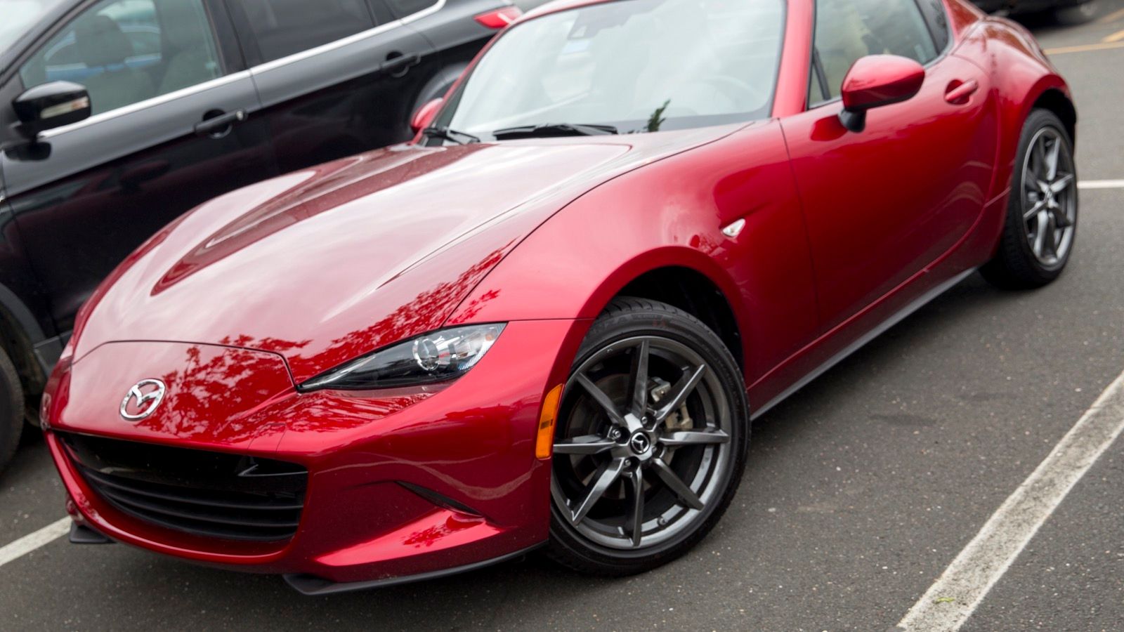 2018 Mazda MX-5 Miata RF Grand Touring, ND fourth generation — Soul Red Crystal retractable fastback, front three-quarter view