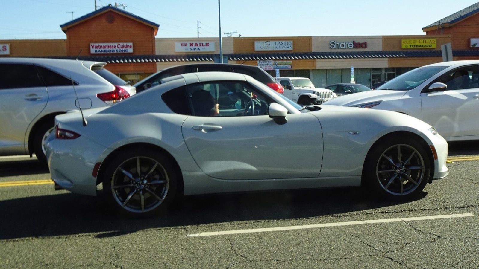 2022 Mazda MX-5 Miata RF, ND fourth generation — white Retractable Fastback, side view