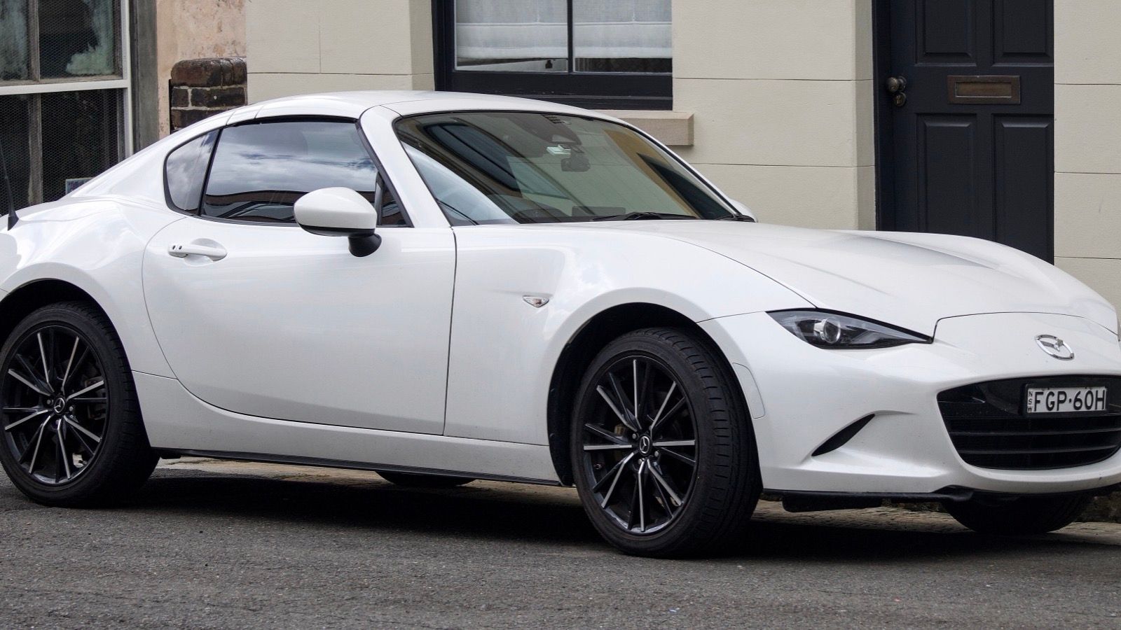2024 Mazda MX-5 Miata RF, ND fourth generation — white Retractable Fastback, front three-quarter view