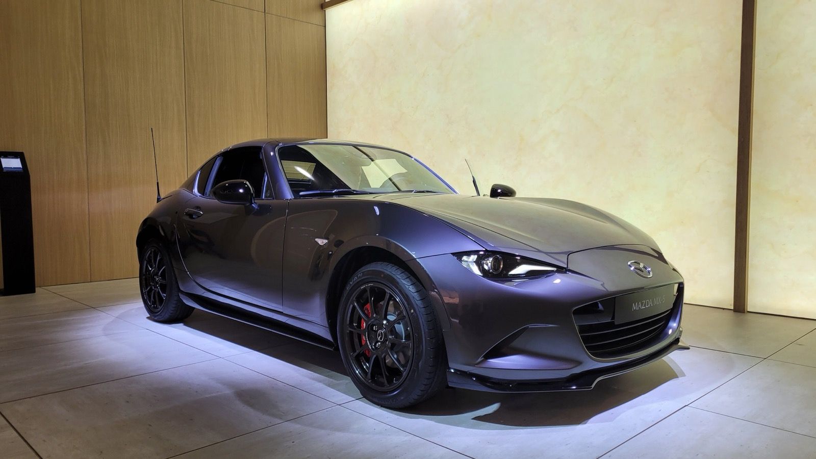 2026 Mazda MX-5 Miata RF, ND fourth generation — grey Retractable Fastback, front three-quarter view