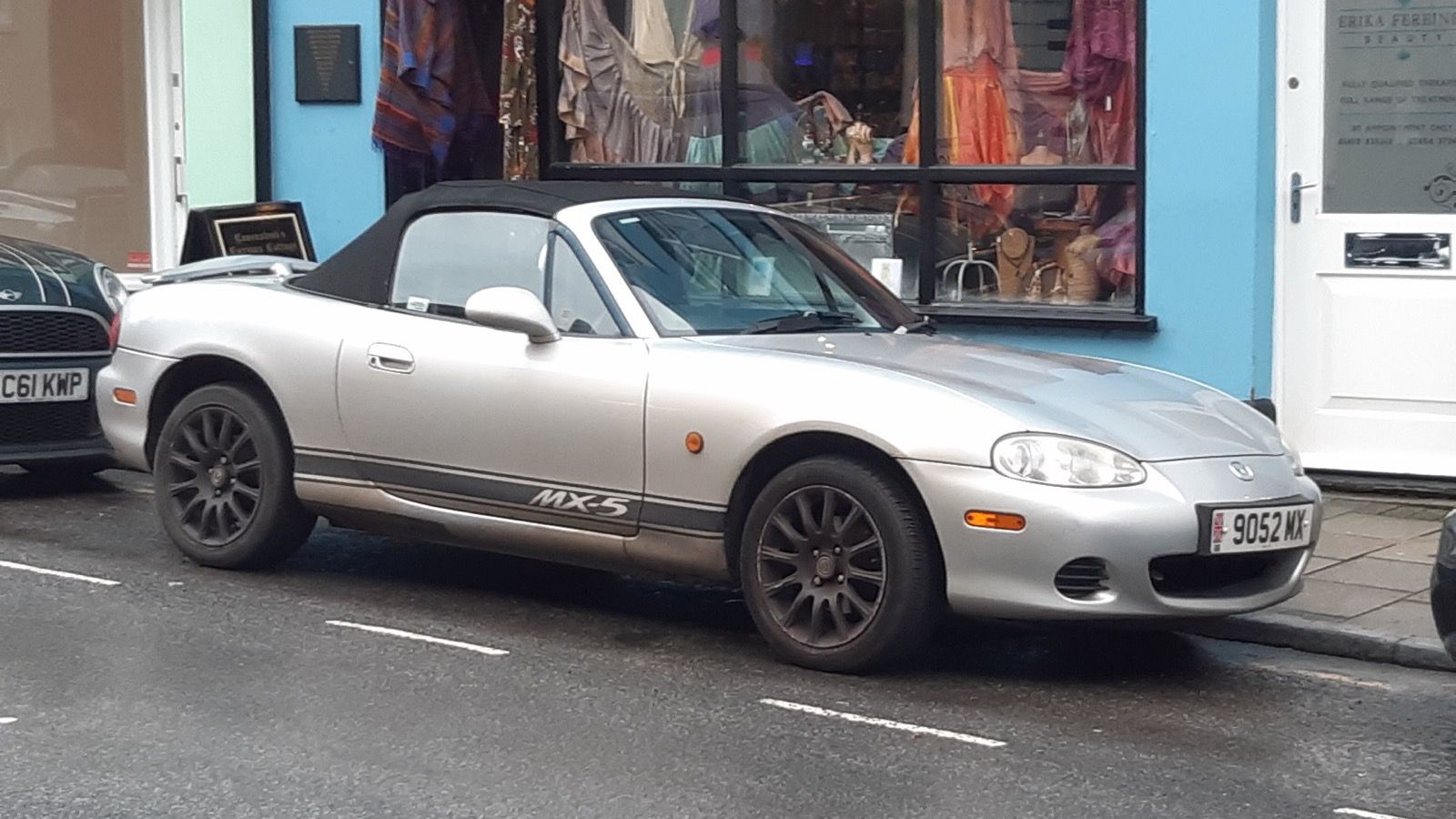 Second-generation Mazda MX-5 Miata (NB) — Sunlight Silver roadster, front three-quarter view