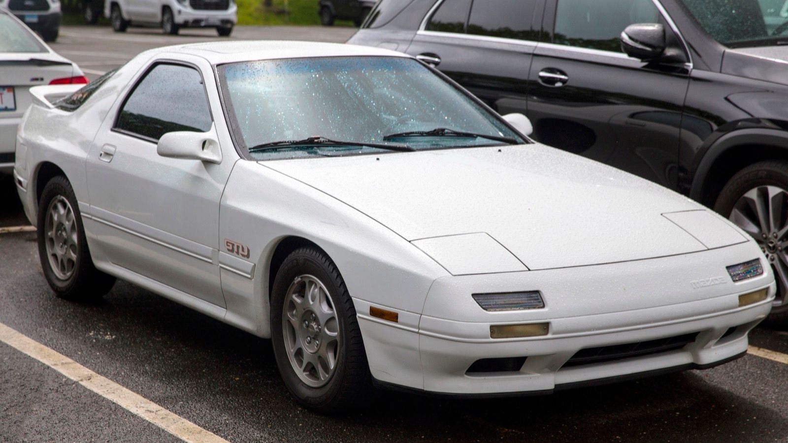 White 1989 Mazda RX-7 GTU, front three-quarter view