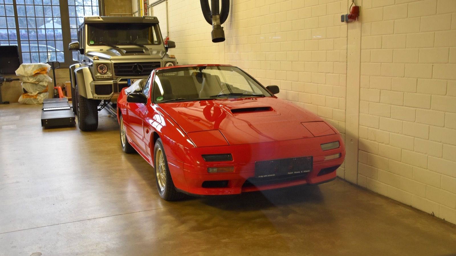 Red 1991 Mazda RX-7 Turbo Cabriolet, front three-quarter view
