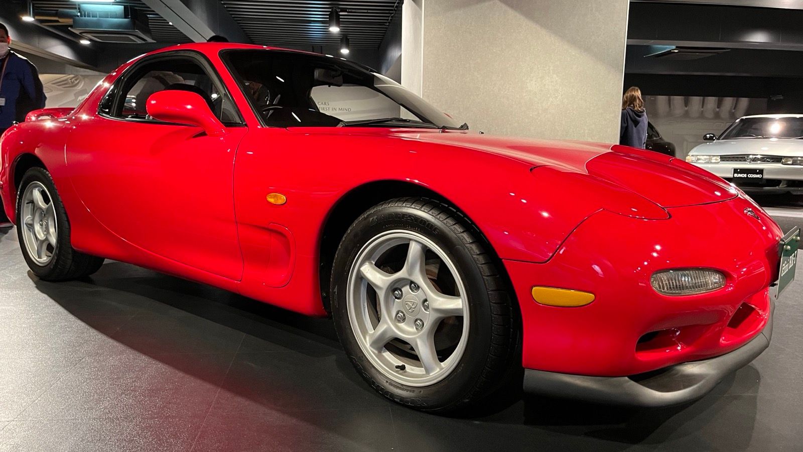 Red third-generation Mazda RX-7 (FD), front three-quarter view