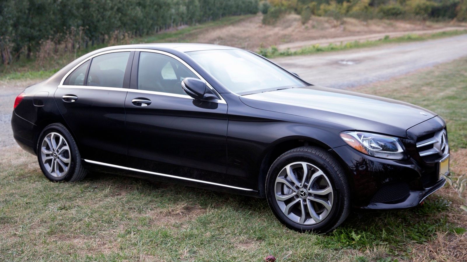 2018 Mercedes-Benz C300 4Matic in Black, front right, front three-quarter view