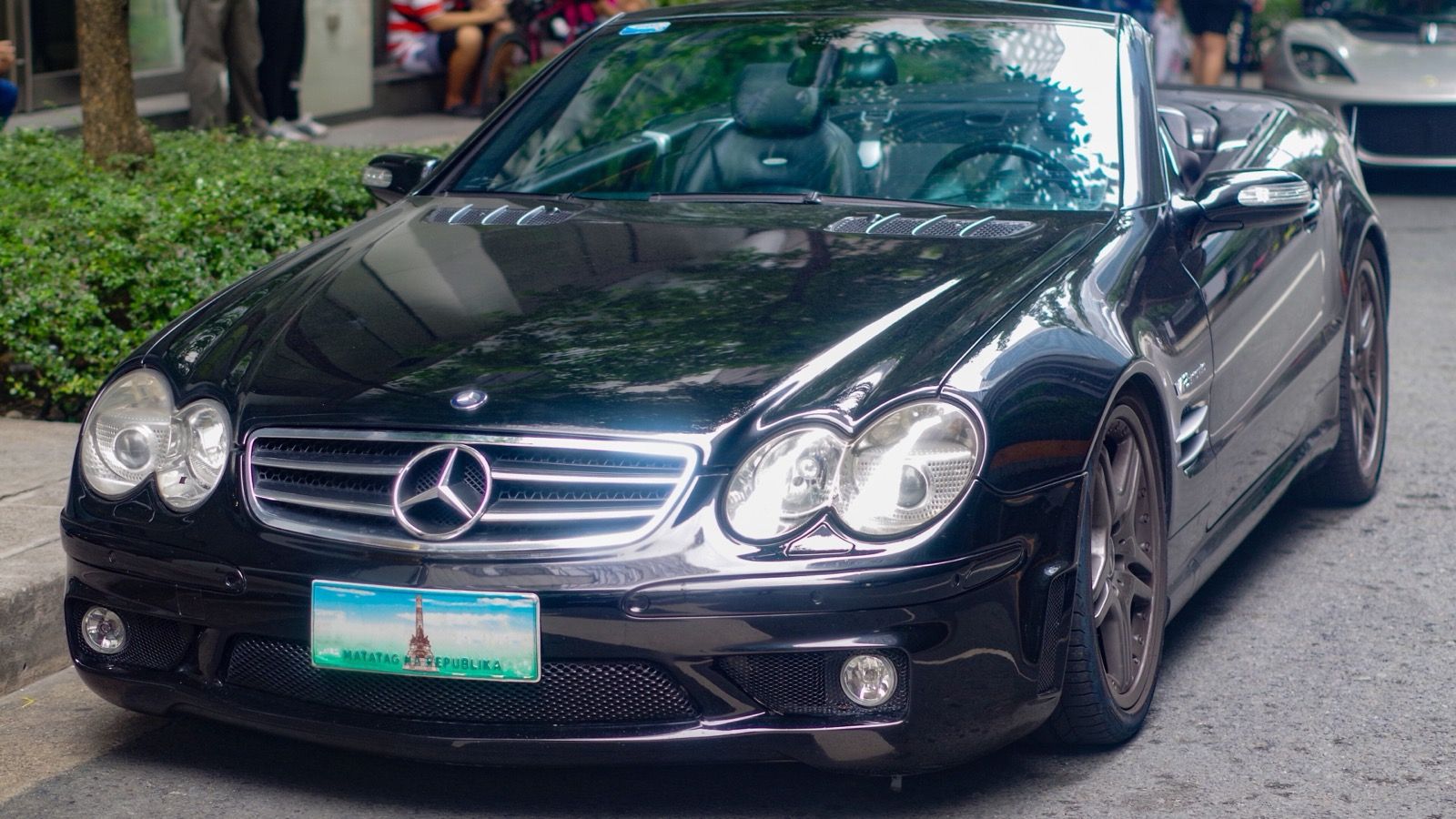 2008 Mercedes-Benz R230 SL 65 AMG V12 Bi-Turbo in Majestic Black Metallic, front left, front three-quarter view