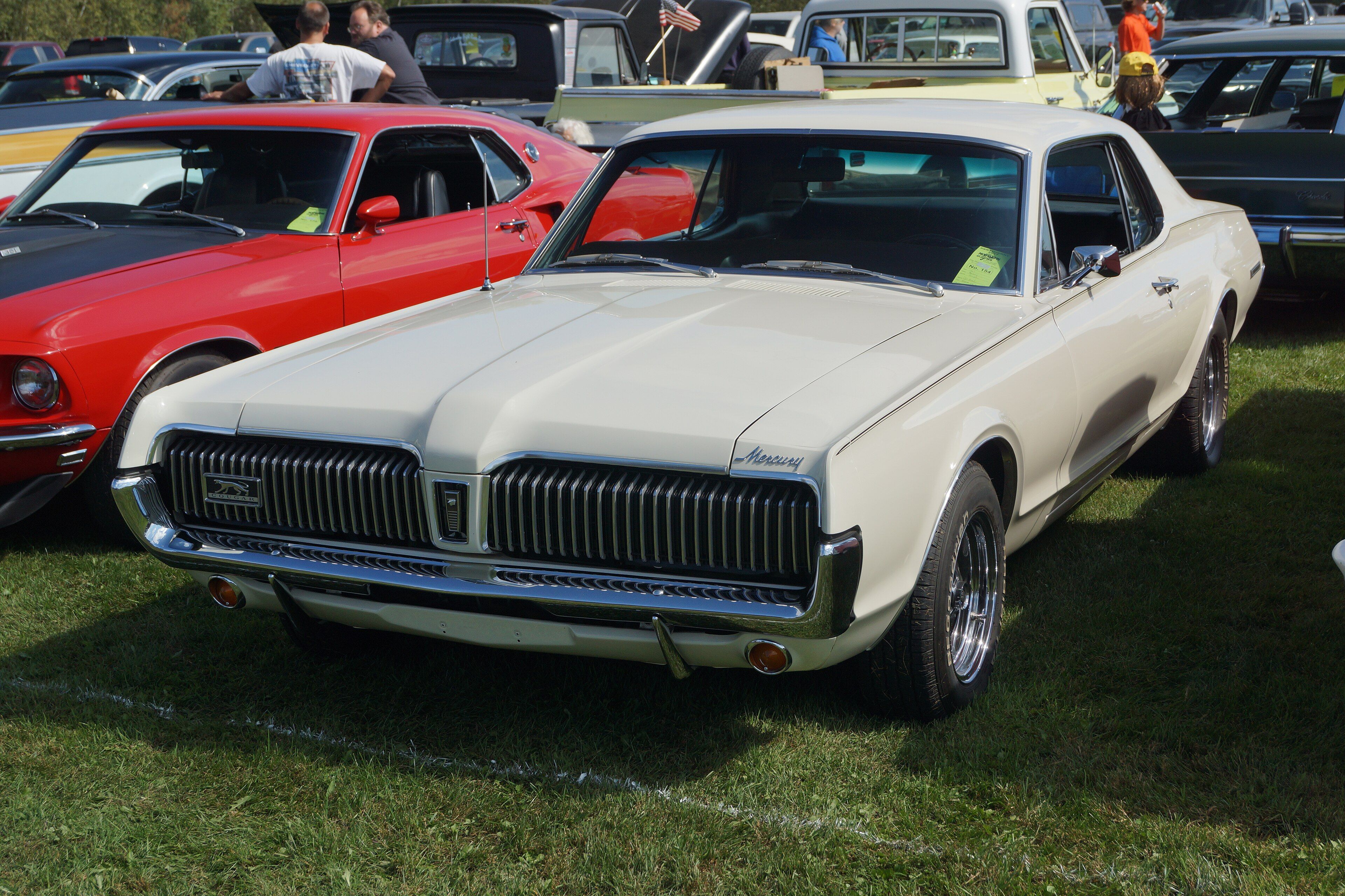 Red 1967 Mercury Cougar first-generation hardtop coupe, front three-quarter view