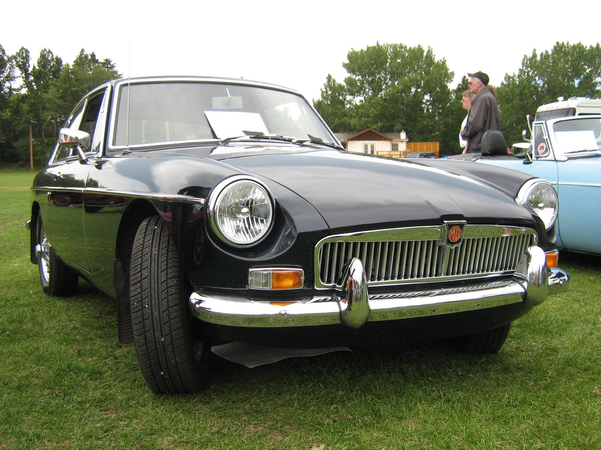 Black 1971 MG B GT coupe, front three-quarter view