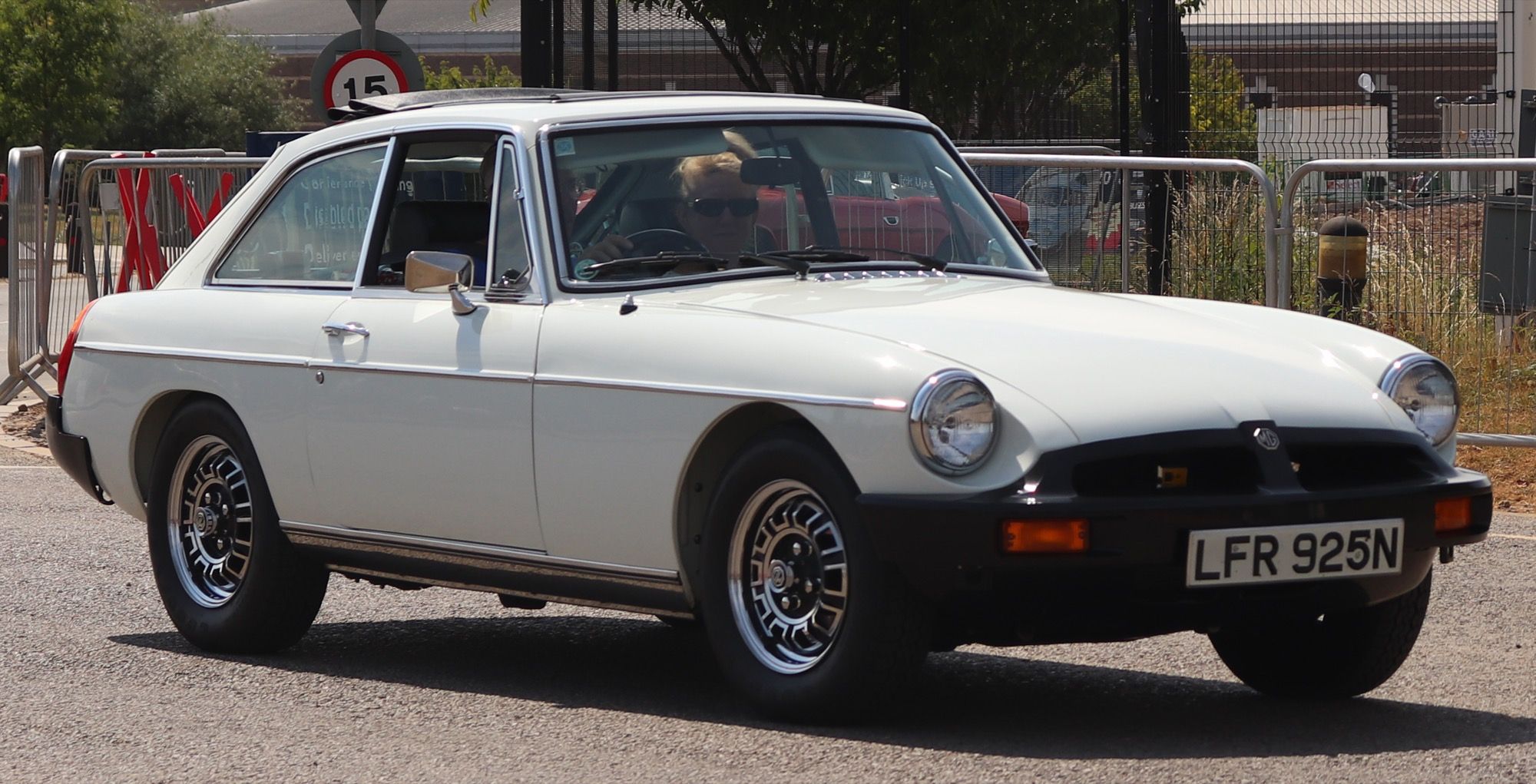 White 1975 MG B GT V8 rubber-bumper coupe, front three-quarter view