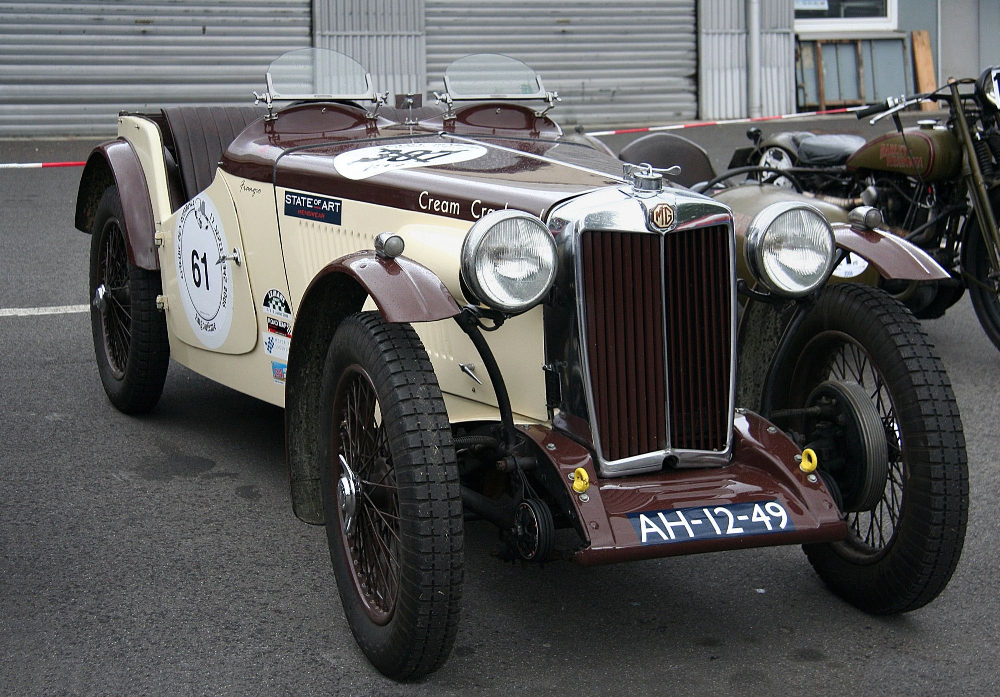 Green 1936 MG TA Midget roadster, front three-quarter view