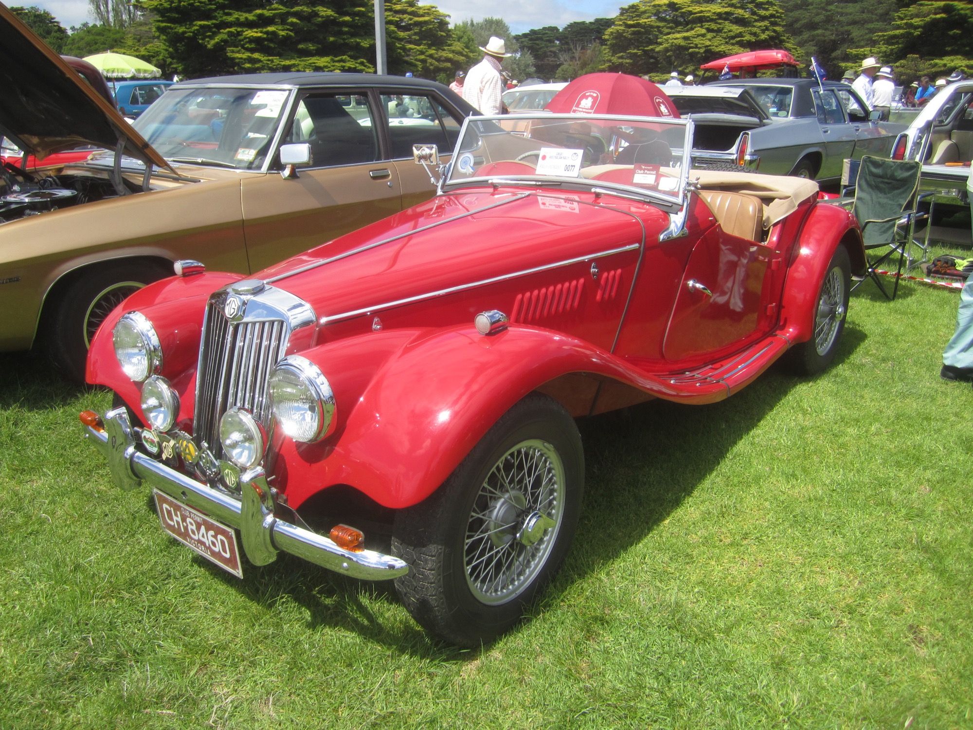 Red 1953 MG TF roadster, front three-quarter view