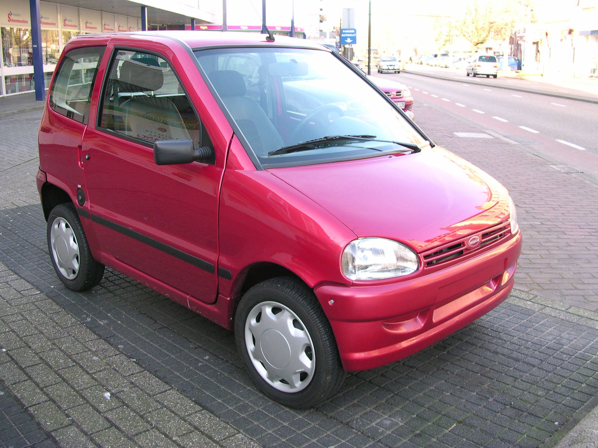 Microcar Virgo quadricycle hatchback, front three-quarter view