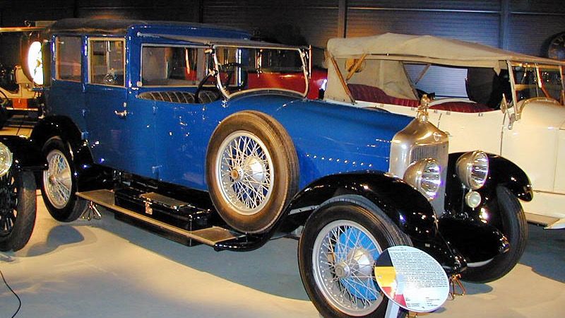 Blue 1924 Minerva Type AB 20CV landaulette on museum display, front three-quarter view