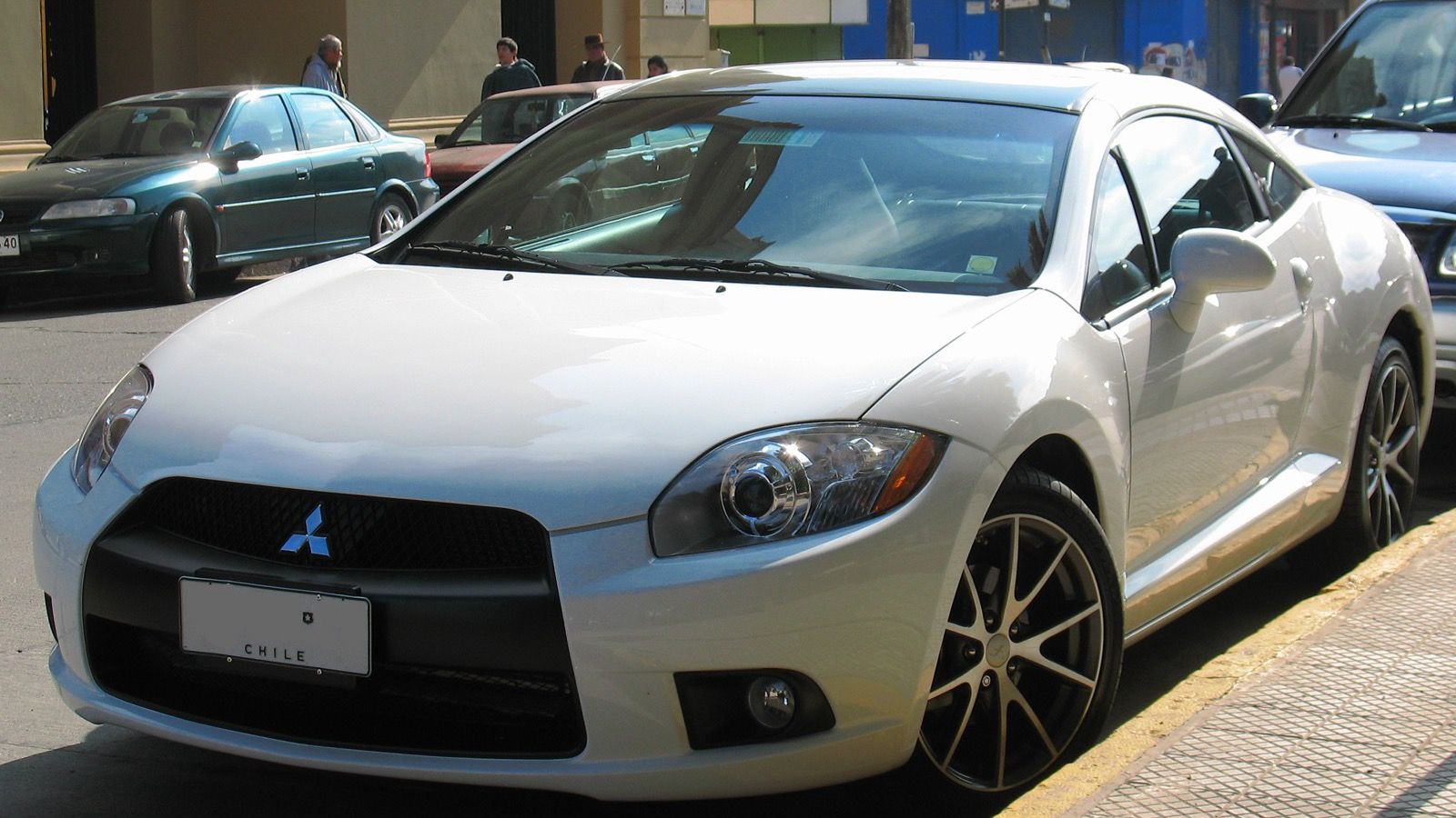 White 2011 Mitsubishi Eclipse GS Sport coupe, front three-quarter view