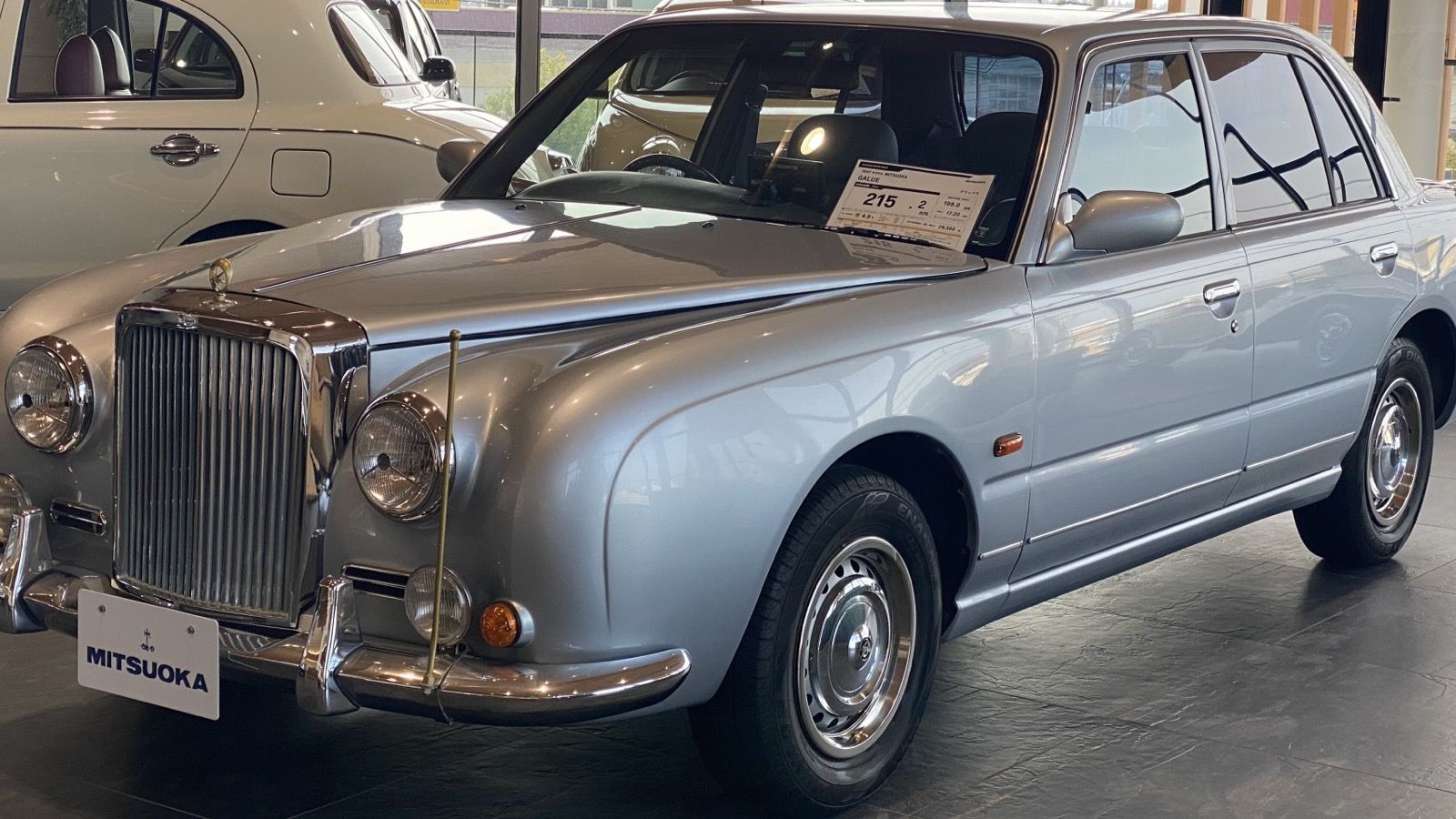 1997 Mitsuoka Galue Deluxe in silver-blue, front three-quarter view