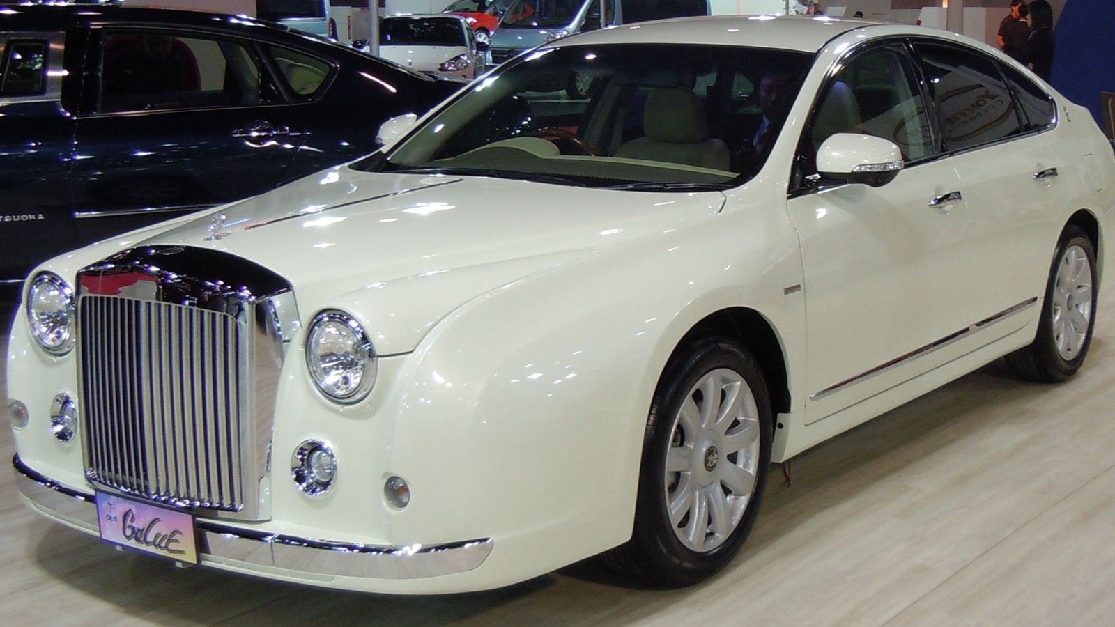 2011 Mitsuoka Galue in pearl white, front three-quarter view