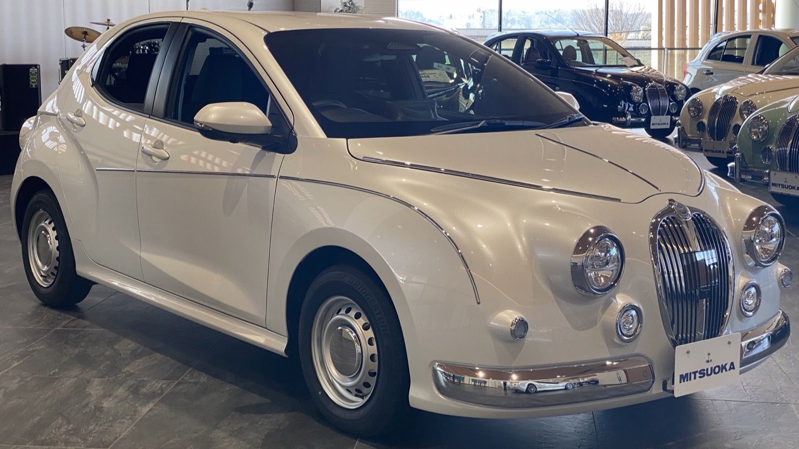 2024 Mitsuoka Viewt Story in white, front three-quarter view