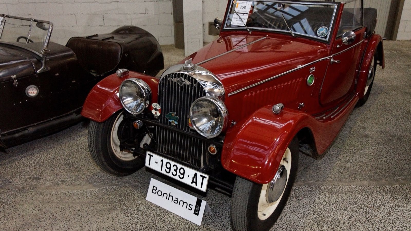 Red 1939 Morgan 4/4 Drophead Coupé, front three-quarter view