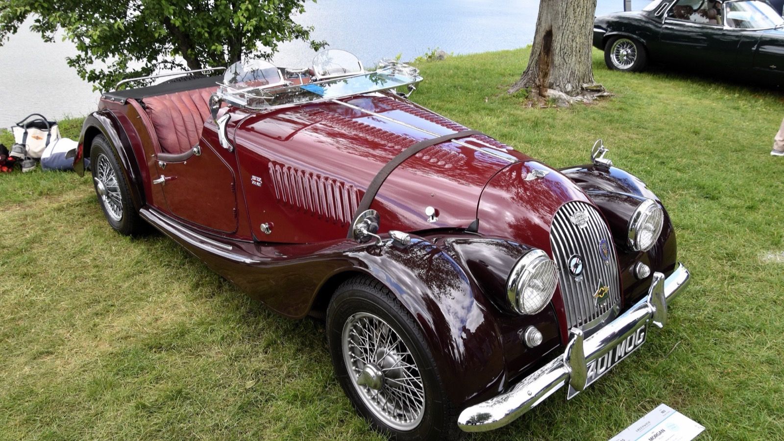 Maroon 1960 Morgan Plus 4 roadster with wire wheels, front three-quarter view
