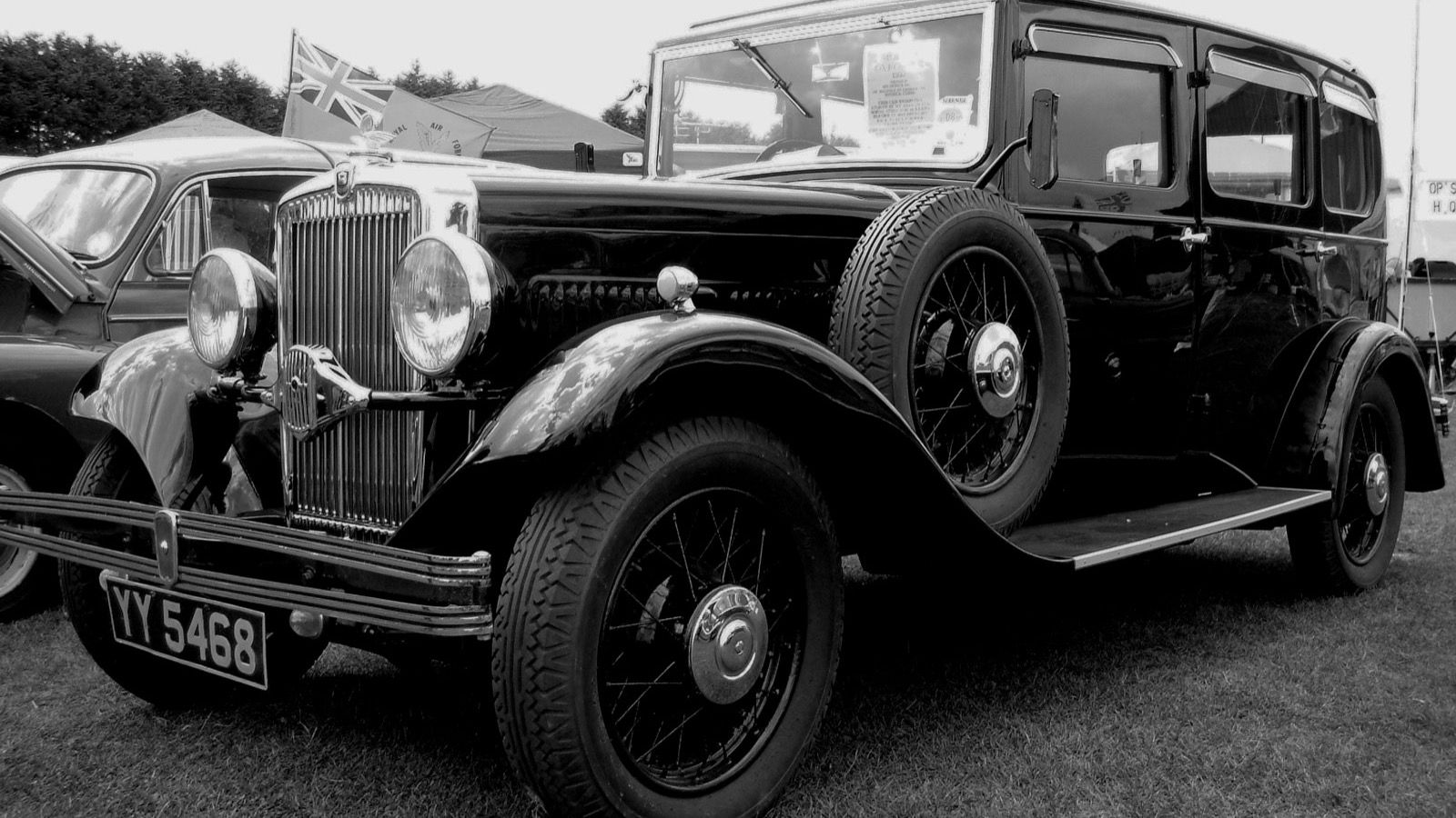 Black 1933 Morris Oxford Six saloon, front three-quarter view (black and white photograph)