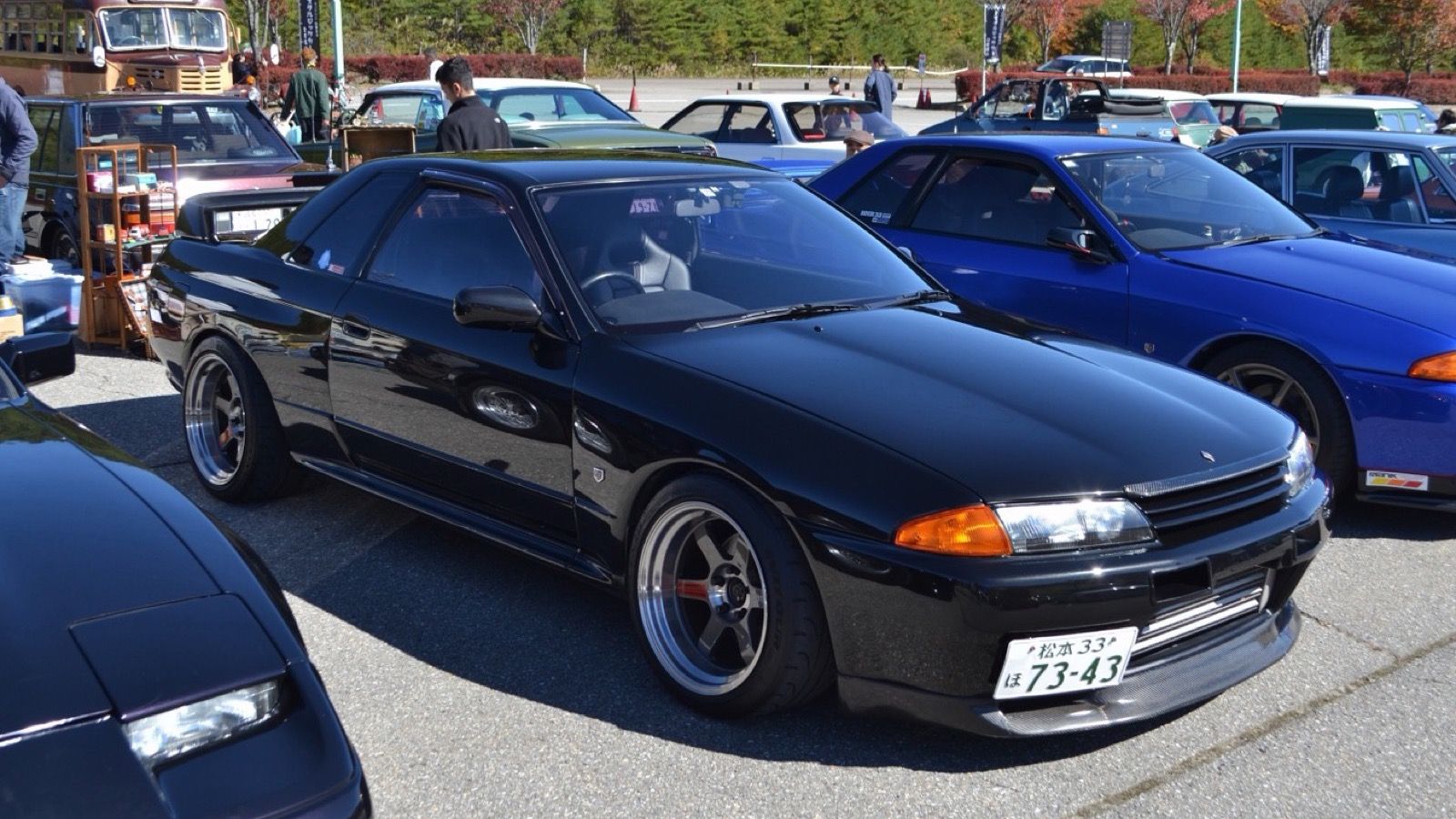 Black Nissan Skyline GT-R (R32) coupe, front three-quarter view