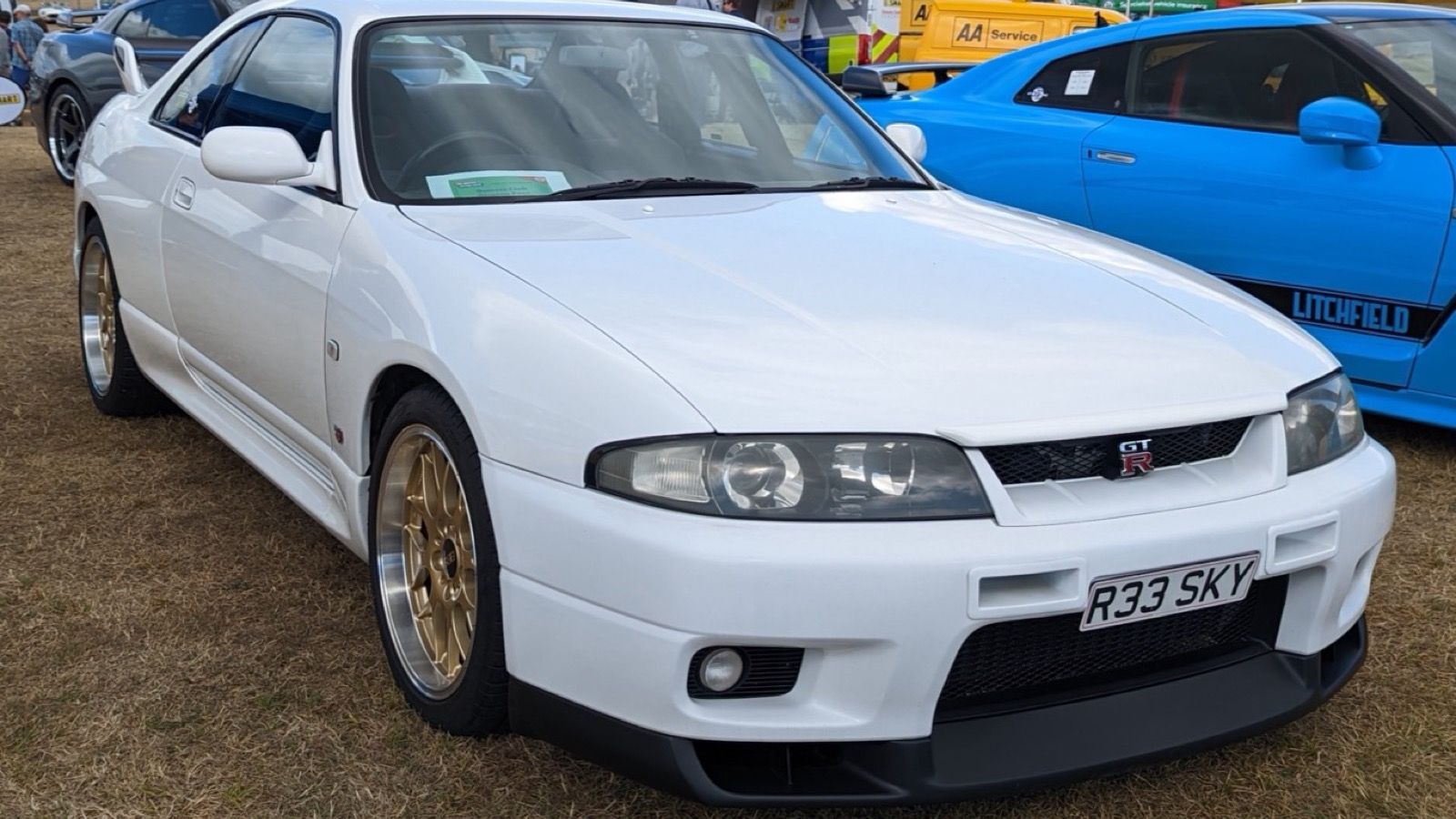 White 1997 Nissan Skyline GT-R V-Spec (R33), front three-quarter view